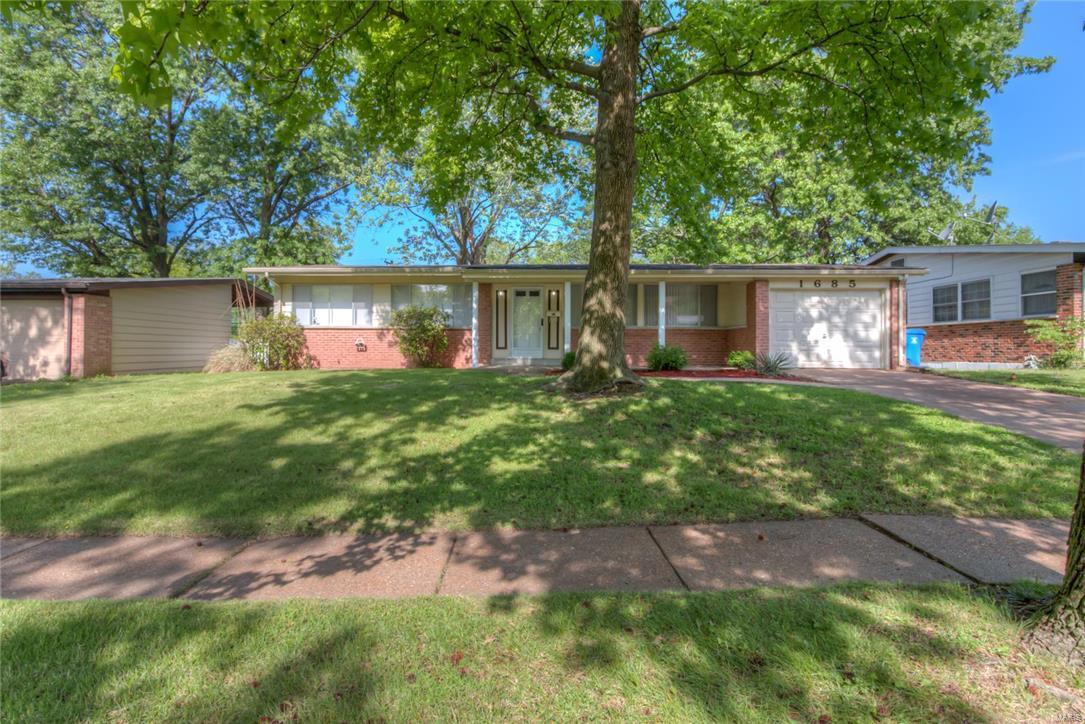 Come see this beautiful cozy 3 bed, 2 bath ranch on quiet street! Featuring fresh neutral paint and new flooring throughout, this house is bright and airy with lots of natural light. Large vaulted great room flows nicely into dining room and kitchen and sets up perfectly to entertain year round. Sliding door leads to covered patio and beautiful fenced back yard that also features a large deck for entertaining. Exterior landscape has been updated and the home is surrounded by beautiful mature trees. Partially finished lower level boasts a HUGE rec room that's perfect to let the kids play or to set up as a spacious media and entertainment center for the latest movie or big game! Additional finished space in lower level is great for a private office. All the work has been done, and it is waiting for you! There is nothing to do here but move in. Home is also just minutes away from all your dining, shopping, and entertainment needs. Act quick on this one, home will be gone in a flash!