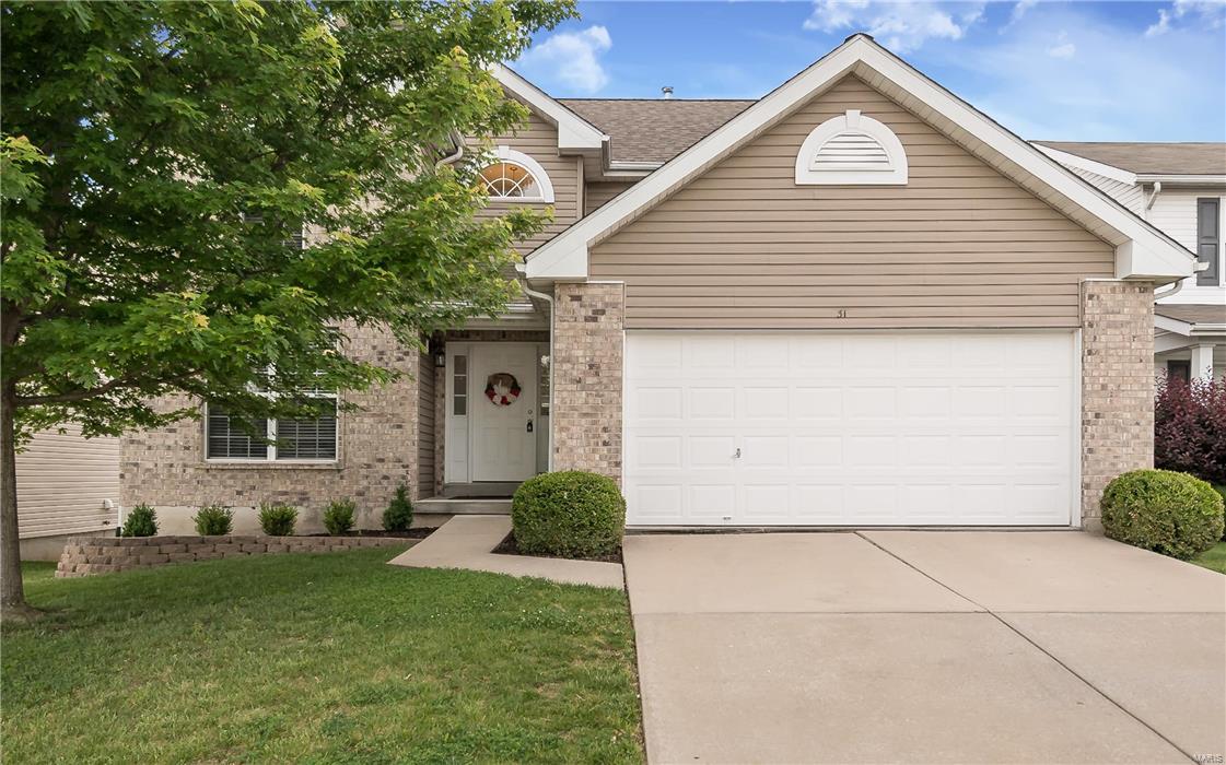 Welcome Home! Gorgeous 2 story with Brick exterior greets you upon arrival. Step on up to a covered front porch and enter to find a 2 story Entry Foyer with beaming wood floors and stunning wood spindled staircase. GORGEOUS! This home has 4 Bedrooms, 2.5 Baths with a Walk-Out Lower Level to a fully fenced back yard. Separate Dining room that leads to the HUGE Kitchen with a big Center Island/breakfast bar, Large Walk-In Pantry, built-in desk, Breakfast room with bay window. Kitchen is open to the spacious Family room with large bay window. Upstairs you have a Master Suite with LARGE walk-in closet. Master Bath has dual sinks and Linen Closet. Additional bedrooms are nice size as well. 9 ft. Pour in Walk Out Basement also has rough-in bath and a partially finished room that could easily be used additional office/rec space. Home backs to Partially wooded common ground and is situated on a Cul-De-Sac Street. Close to Shopping and Splash Station! HURRY! WILL NOT LAST LONG!
