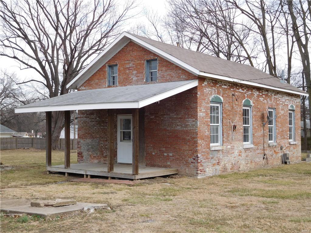 Excellent opportunity to refurbish this "Old School House" for a private residence or develop the land for your own plans.  The almost 1 acre lot of land, with 209' of frontage on Shackelford, is completely level and has the potential for residential development, multifamily development, and the possibility for commercial use.  A large storage building is also located on the property that is ideal for lawn care equipment and other personal items.