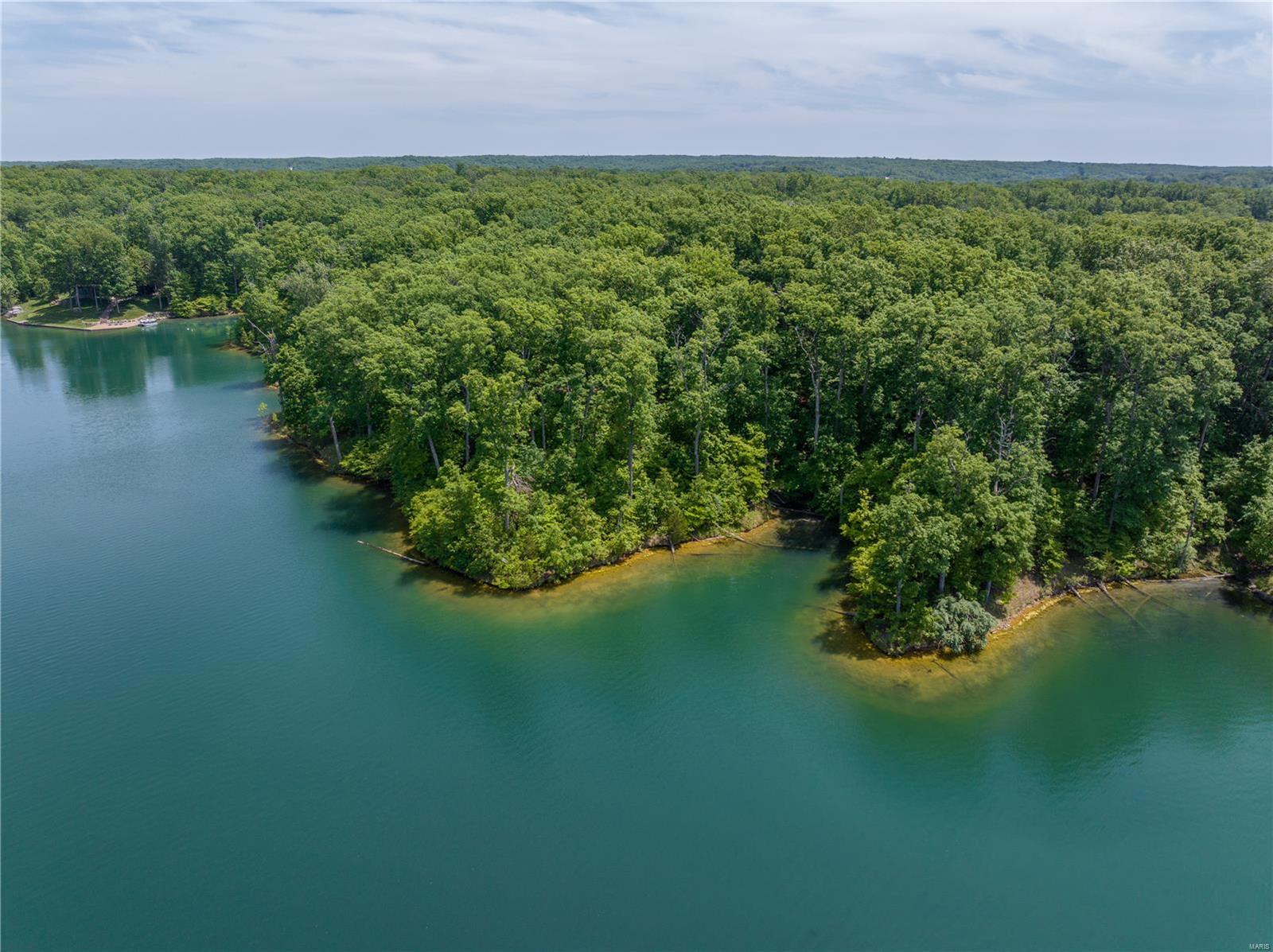 The most desirable lot left!  Only double lot available with over 650 FEET OF SHORELINE ON LAKE ALPINE!!!!!!!!!!
This is your chance to build your custom dream home on 237 acre Lake Alpine. Enjoy Panaramic views and incredible privacy on this 2.38 acre dream land. Your home will feel like it's own island with two points
Don't miss this opportunity!!