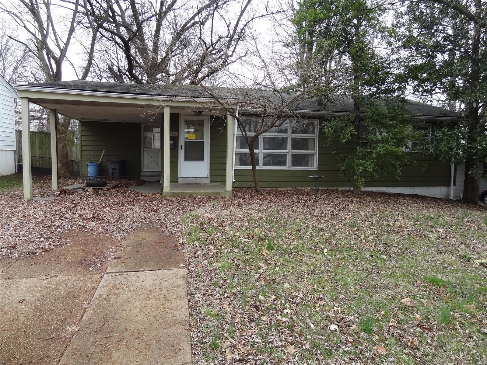 3 bedrooms 2 baths with one bath up and one bath down. Some finish in the lower level. Glass atrium room addition next to the kitchen area makes for a light and bright breakfast area. Fenced in yard, storage shed, and carport. Some hardwood floors. Wood burning stove in partial finished lower level. Large level fenced yard with storage shed and fenced in the garden area. Has covered patio for summer BBQs. Plenty of trees for shade front and back.