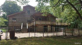 Special River Front Home Opportunity! Here is your chance to live on the water. This Jefferson County home is located on a 3rd acre with 120ft of river frontage & will be the perfect place for your relaxing weekends! You will enjoy the quite country setting. Located on the Big River, this is the perfect location for the avid Hunter & Fisherman. The open floor plan includes 2 bedrooms on the main level with a spacious Great Room & Kitchen area.  Bonus living area in the Loft allows for more guests.  This home was affected by the flood in 2016. It will need significant renovation including a new kitchen, flooring and drywall on the main level. The owner completed the clean up by removing the flooring & drywall. This property is being sold AS IS. Seller to do no inspections or repairs. Come see this home before its gone. All serious offers will be considered.