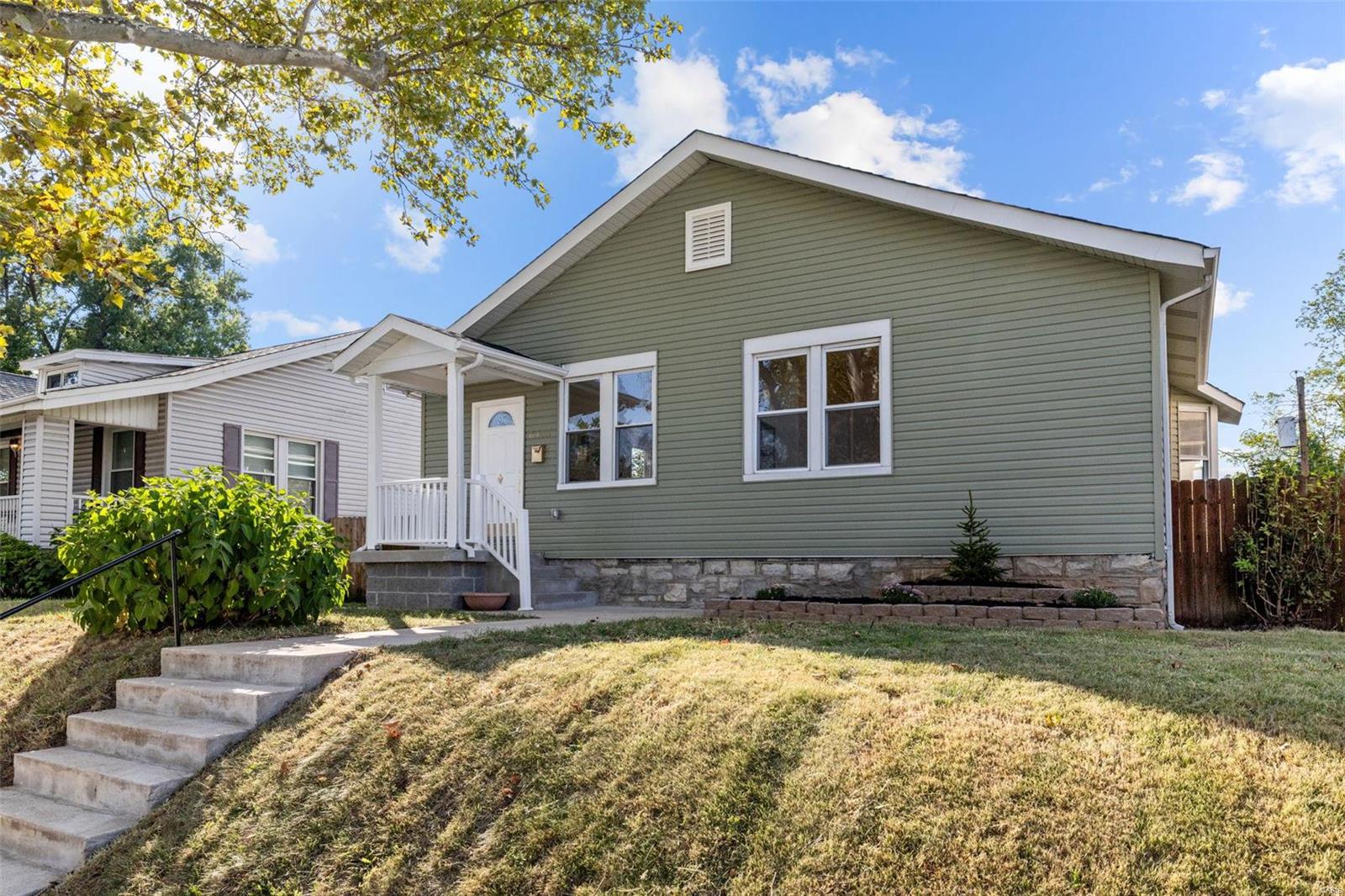 This completely remodeled 3-Bedroom home in Holly Hills is what you’re looking for! As you walk in you will immediately notice all the space for entertaining the open floor concept offers. The living room welcomes you with the modern fireplace, large windows with plenty of natural light and luxurious vinyl flooring throughout the home.  Beautiful spacious new kitchen with white cabinets, quartz counters, center island, all new SS appliances and gorgeous fixtures it’s ready for memories. Then comes the mudroom where you will find a half bath, closet, laundry and access to the spacious covered deck. The deck it is shared with the master bedroom too, which includes it’s own luxurious bathroom and a walk in closet. Two other large bedrooms share the third beautiful bathroom of the house. The high and walk out basement offers plenty of possibilities too. Backyard is surrounded by magnolias and hydrangeas, two car garage and privacy fence. This house has it all, come and see it!