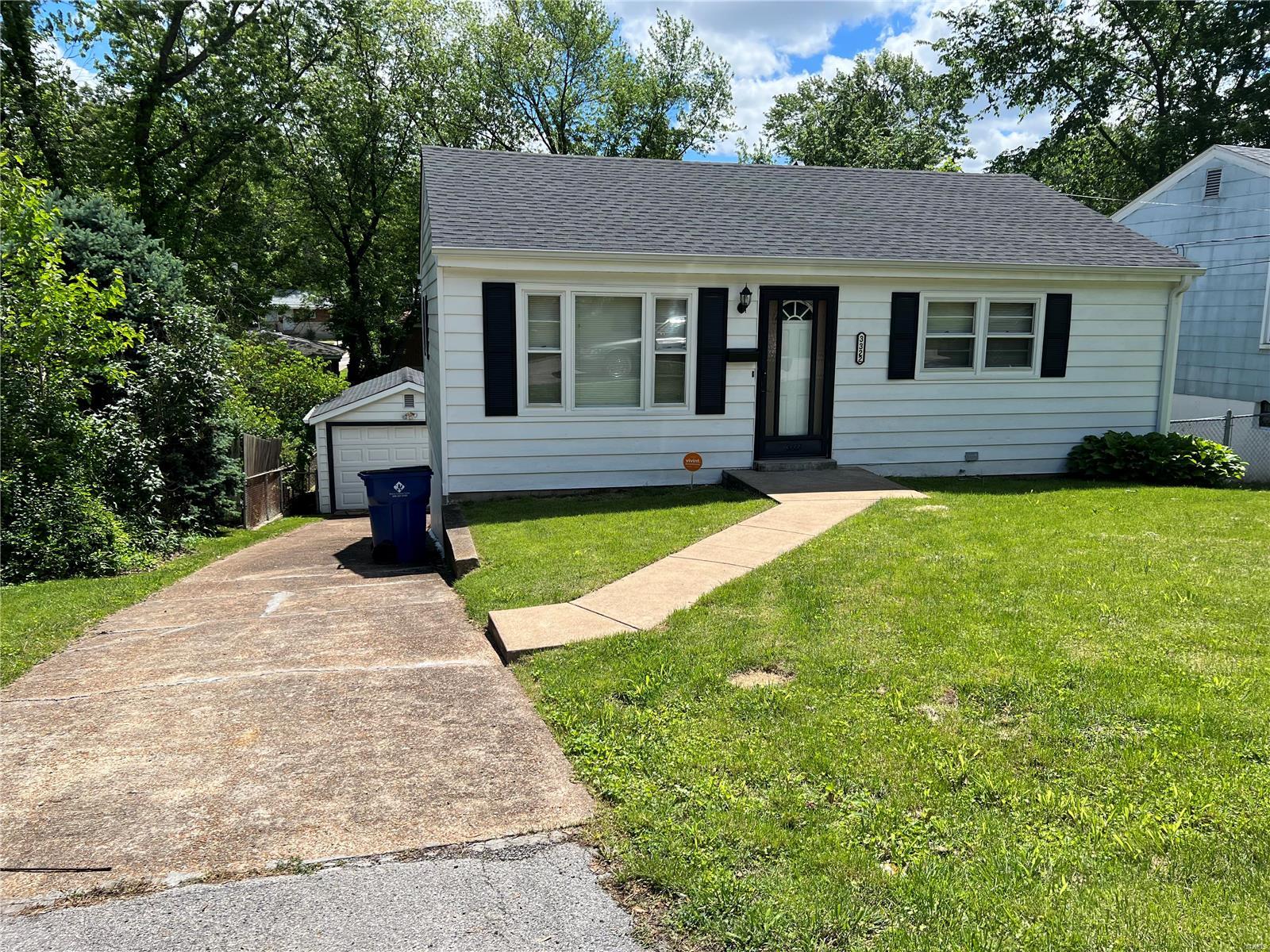 You won't want to miss this nicely updated bungalow. It has beautifully finished wood floors in the living room, hall and bedrooms. An updated bathroom and kitchen with new flooring, cabinets, and fixtures. There is a half bath in the partially finished basement along with a great space for a rec room or family room. You can walk out of the basement to a large fenced backyard with a side access door to the detached garage. New roof & gutters on the house and garage in 2019 and new HVAC in 2021. Hurry before it's gone
