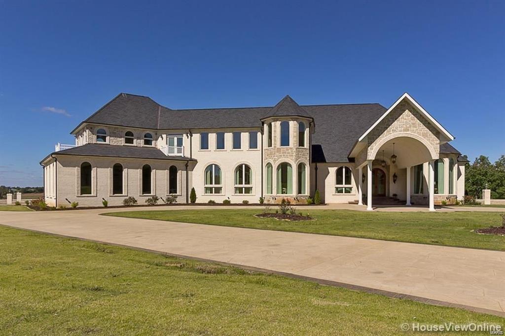Custom home professionally designed and decorated by Rust & Martin.  A lot of natural light and defined rooms but open and inviting.  Top of the line appliances.  Two master suites separated with combined living areas.  Three laundry room.  8,738 sq. ft. of space on 6.26 acres.  Only qualified buyers with bank approval, please.  Agent is related to seller. Seller will consider a trade.