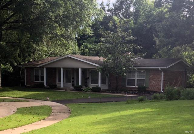 Owner managed and well maintained Chesterfield Ranch welcomes you with a large front porch. 3 bedrooms on main floor and 1 in lower level (possible MIL suite with separate shower and whirlpool tub). All baths are updated & tiled. First floor features hardwood floors, over-sized kitchen, pantry, planning desk and glass-walled sitting area/breakfast room. Bright kitchen highlights vaulted ceiling and windows overlooking the backyard and wooded common grounds. Appliances provided: refrigerator, dishwasher, disposal, microwave, glass-top range. Open staircase leads to LL with wood burning fireplace, sunroom, storage, laundry hook ups & living area. Neutral paint throughout. Two car rear entry garage with large turn around area and driveway. This house has a flexible floor plan & feels larger than square footage indicates. The home is within walking distance to restaurants and shops. The neighborhood is full of wooded common ground, and the home is an easy walk to the neighborhood pool.