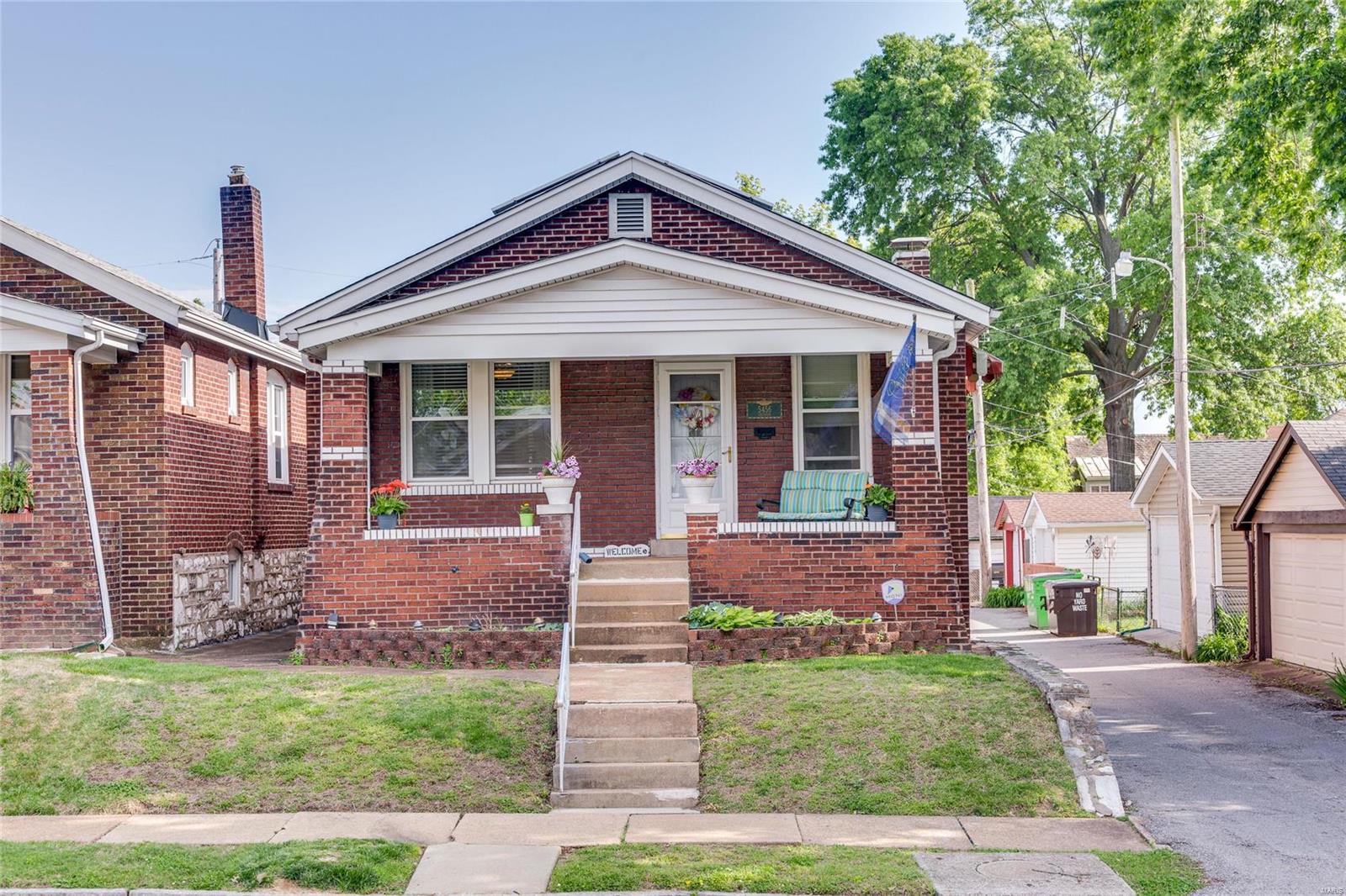 Charming two bedroom brick bungalow on a quiet street in the Princeton Heights neighborhood is sure to please! The home opens to a spacious sun-filled living room that leads to a large dining room, perfect for holiday entertaining! The updated kitchen features plentiful sparkling white cabinetry, granite countertops, black appliances and pantry. The master bedroom is comfortably sized and offers ample closet space. The second versatile bedroom is also comfortably sized. A full bath completes the main level. The lower level offers plenty of storage space. Newer laminate flooring and carpeting throughout. Think Green! Solar energy panels significantly reduce electric consumption! The level back yard with privacy fence is sure to be the highlight of outdoor entertaining. The covered front porch, back porch, detached garage and fresh tuckpointing only adds to the curb appeal of this home. A home warranty is being offered for your peace of mind. Close to highways, shopping and so much more.