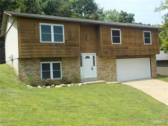 Great 1st time home buyer home has had a number of updates including some ceramic tile in family room, other flooring through out main level of home. covered back patio great place for that bar b q.  separate dining and kitchen.  Master bed room with full bath. 2 full bathrooms and a rough in on the lower level. oversized 2 car garage, newer windows, Seckman Schools 
Just a few minutes from I55 highway access. close to most anything you could need.
Seller has never used fireplace condition of flu is unknown.