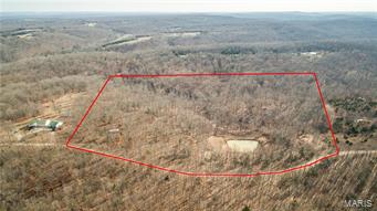Tons of potential in these beautiful 14.11 unrestricted acres. Electric on site, perfect for building your dream home! Ideal for the outdoorsman in us all. 10' deep pond, stocked and ready. Perfect hunting getaway. Road frontage property makes for easy access. Don't let this one get away.