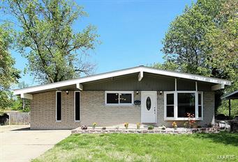 Great New Price and new updates! Fresh colorful landscaping, updates galore, & quiet neighborhood makes this 4 bed/2 full/2 half bath ranch pop! Open, spacious floor plan, vaulted ceilings, natural sunlight, & gleaming hardwoods greet you. Large living room and neighboring dining are perfect spaces for hosting friendly gatherings. Open kitchen features quartz counters, stainless appliances, & center island with breakfast bar. Master bedroom suite features ample closet space & half bath. Adjoining room off master is ideal for nursery or office space, and includes full bath. Two additional bedrooms are equally nice sized, additional full bath, & family room with fireplace complete main level. Partially finished lower level is THE spot for movie night or relaxing after a long day. Sleeping area, half bath, & storage space finish off lower level. Huge fenced yard is lush green offering space enough for play, relaxing, or garden. Over-sized utility shed & parking pad complete this property.