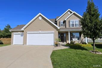 LIKE NEW 6 YEAR OLD 2STORY ON QUIET CUL DE SAC W/3 CAR GARAGE*****NEW FRIESE CARPET 2014*****KITCHEN/BREAKFASTROOM W/MAPLE CABINETS, WOOD FLOORING,BUTTERFLY ISLAND & BLACK APPLIANCES OPENS TO SPACIOUS FAMILYROOM***FORMAL DINING****FORMAL LIVINGROOM****BEAUTIFUL WOOD FLOORING IN FOYER****MAIN FLOOR LAUNDRY*****DECK OVERLOOKS PRIVATE TREE LINED YARD*****VAULTED MASTER SUITE W/WALK-IN CLOSET, LUXURY BATH W/DOUBLE SINKS AND SEPARATE TUB & SHOWER**** 3 ADDITIONAL BEDROOMS ARE SPACIOUS AND HAVE WALK-IN CLOSETS*****TASTEFUL DECORATOR COLORS*****INGROUND SPRINKLERS***NICE CURB APPEAL INCLUDES A PORCH TO RELAX ON****ELEMENTARY SCHOOL ADJOINS THE SUBDIVISION****SUBDIVISION POOL*****IMMEDIATE ACCESS TO I70*****DON'T WAIT TO BUILD*****MOVE IN READY & PRICED TO SELL******