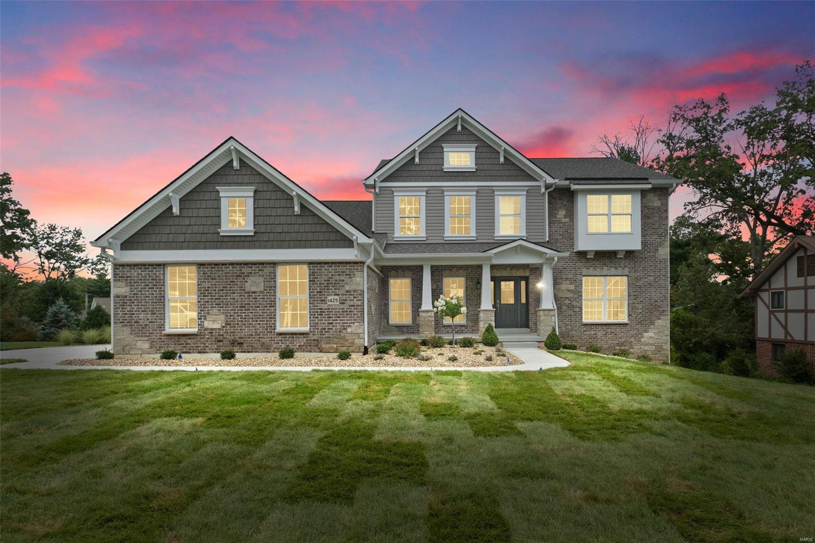 Spectacular, new construction by Genesis Development in Des Peres! This home will wow you with incredible curb appeal featuring a brick façade, stone accents, columns w/stone bases, shake accent siding in the gables and a side entry 3 car garage. This 5 Bd, 4.5 BA, 1.5 story has 5,104 sq ft of dynamic living space (inc 1,301 sq ft of lower level finish) and a MAIN FLOOR MASTER. Features inc an impressive, on-trend Kit, large island, solid surface counters, gas c-top, double ovens, Butlers pantry, 9 ft ceilings, luxurious bathrooms, gas FP, Smart home system, Hi Efficiency gas furnaces, family foyer w/cubbies, hardwood floors, carriage style garage doors, 9 ft basement pour, lower level wet bar, Walkout basement and composite deck. Enjoy nearby parks, restaurants, shops and easy access to Hwys 270,40/61, I-44 and Lambert International. Desirable Kirkwood schools. This home is under construction and scheduled for an August 21, 2024 completion. COOL: 14 SEER+