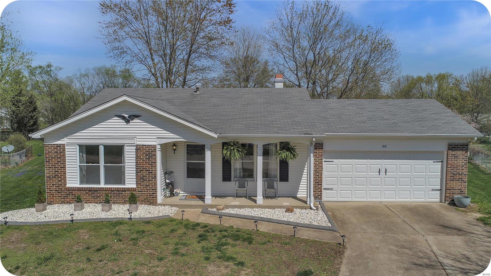 If you have been looking all over STL for a home and think you can't have it all, THINK AGAIN! 65 W. Douglas has you COVERED! On the main floor, enjoy the spacious living room with a cozy FIREPLACE, a recently RENOVATED light-and-bright kitchen and an eat-in dining area. Round the corner, two bedrooms and a master with conveniently-connected bathroom finish out the floor! Downstairs, there is a large BONUS ROOM that could easily be used as a guest suite with an attached newly renovated bathroom! Outside, a nice-sized backyard which is already fenced with newer vinyl fencing backs up to common ground for even more space for your kiddos or fur babies to run! There is literally nothing left to update in this house as it has already been beautified from head-to-toe! And the icing on the cake: it is located in a quiet cul-de-sac so you can enjoy your tranquil oasis away from the world's noise! The price tag on this gem is VERY AFFORDABLE! Don't blink or this one will be gone! :)