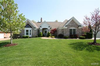 Postcard setting! Enjoy stunning views of golf course and lake in this country club setting. This beautiful atrium ranch on a level lot offers a great room w/soaring ceiling, gas vented fireplace and a wall of windows allowing plenty of natural light into the room. Large kitchen w/granite counters, center island, pantry and spacious breakfast rm. Master bedroom is spacious and neutral with a luxury master bath & walk-in closet. Two add’l bedrooms on main floor. W/O lower level features family room with stone fireplace, wet bar area, 4th bedroom w/built-in shelves; a full bath and den/office room. Other amenities include: new siding, fall of 2014; new front pillars, fall of 2014; Newer roof, some newer windows, crown molding, palladium windows, atrium doors, newer stone wall in yard by patio, covered deck for barbeques and great curb appeal. Buyers will love looking out at # 6th green and #7 tea box.