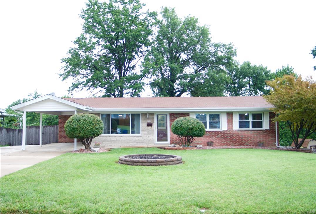 Updated 3 BR full brick ranch in heart of St. Charles!  Enjoy all of the recent updates this home has received!  Updated kitchen features newer maple cabs, ceramic tile floors, alum. back splash, stainless steel appliances and breakfast bar.  The formal Din. Rm offers newer wood laminate flooring as does the entire main floor and finished lower level.  The bright Liv. Rm. has decorative chair rail, ceiling fan and large pic window.  New int. paint in 2015!  Both main floor baths completely remodeled w/hall bath was just done in 2016. Finished W/O lower level has 24x11 rec room, an attractive bar area, laminate flooring, an adjacent 1/2 bath and additional sleeping area.  New HVAC in 2006, WH in 2016.  Attic fan plus ceiling fans in LR & all BRs. Newer vinyl tilt windows & white 6 panel doors & trim throughout.  New roof & gutters in 2007.  Newer expanded driveway & sidewalk to LL patio, attractive landscaping, 12x12 deck, wood privacy fencing & fantastic storage shed in back yard.