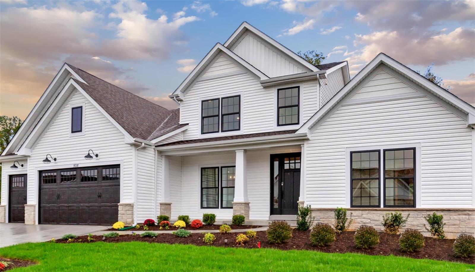 Just Listed – Beautiful builder display home with modern farmhouse elevation! The popular Bridgeport plan from Rolwes company is a gorgeous 1 ½ Story home with high-end finishes and 3-Car Garage. The first floor features an open layout with Formal Dining, spacious Great Room, Dining, Hearth Room Laundry and Powder Room. The open Kitchen is ideal for entertaining with an oversized island, quartz countertops, stainless steel appliances, range hood and walk-in pantry. A beautiful Owner’s Suite with coffered ceilings and stylish Owner’s Bath with access to large walk-in closet can also be found on the first floor. The second floor features a bonus room, two Bedrooms with Jack & Jill Bath, and an additional Bedroom with private Bath. The lower level offers ample space for living or guests complete with Rec Room, a fifth Bedroom, full Bath, and an unfinished area perfect for storage.