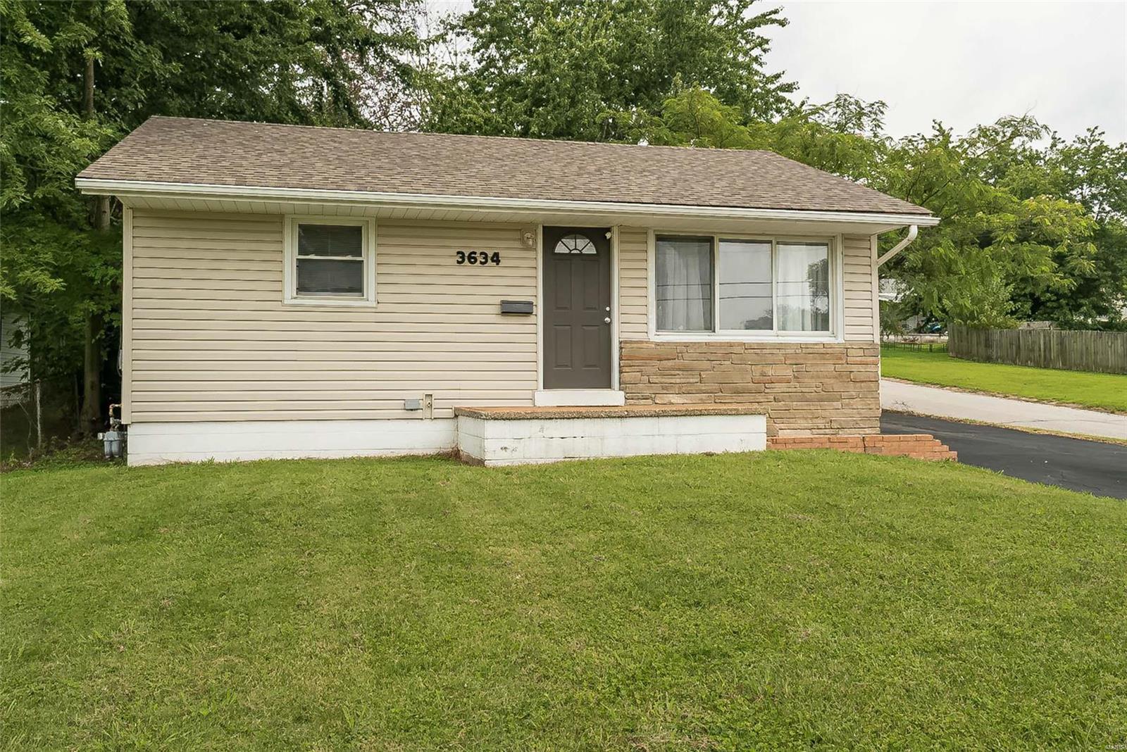 Adorable bungalow in Pattonville Schools is waiting for you to call it home! With a fresh coat of paint, newer carpet, low maintenance flooring. Come on in through the freshly painted front door and into the spacious living room that's full of sunlight. The kitchen features vinyl flooring, lots of cabinets, a 5 burner electric stove and plenty of space for a table. There are two bedrooms with newer carpet, 6 panel doors and large closets. The full bathroom has been updated with ceramic tile surround, vanity, paint & vinyl flooring. A large family room area is off of the kitchen and offers a great space for tv watching and entertaining. The built-in shelving is perfect for storage and a sliding glass door lead out to the spacious & fenced backyard. Walk downstairs to find a partially finished space, the laundry area and utilities. Close to shopping, restaurants, transportation and schools.