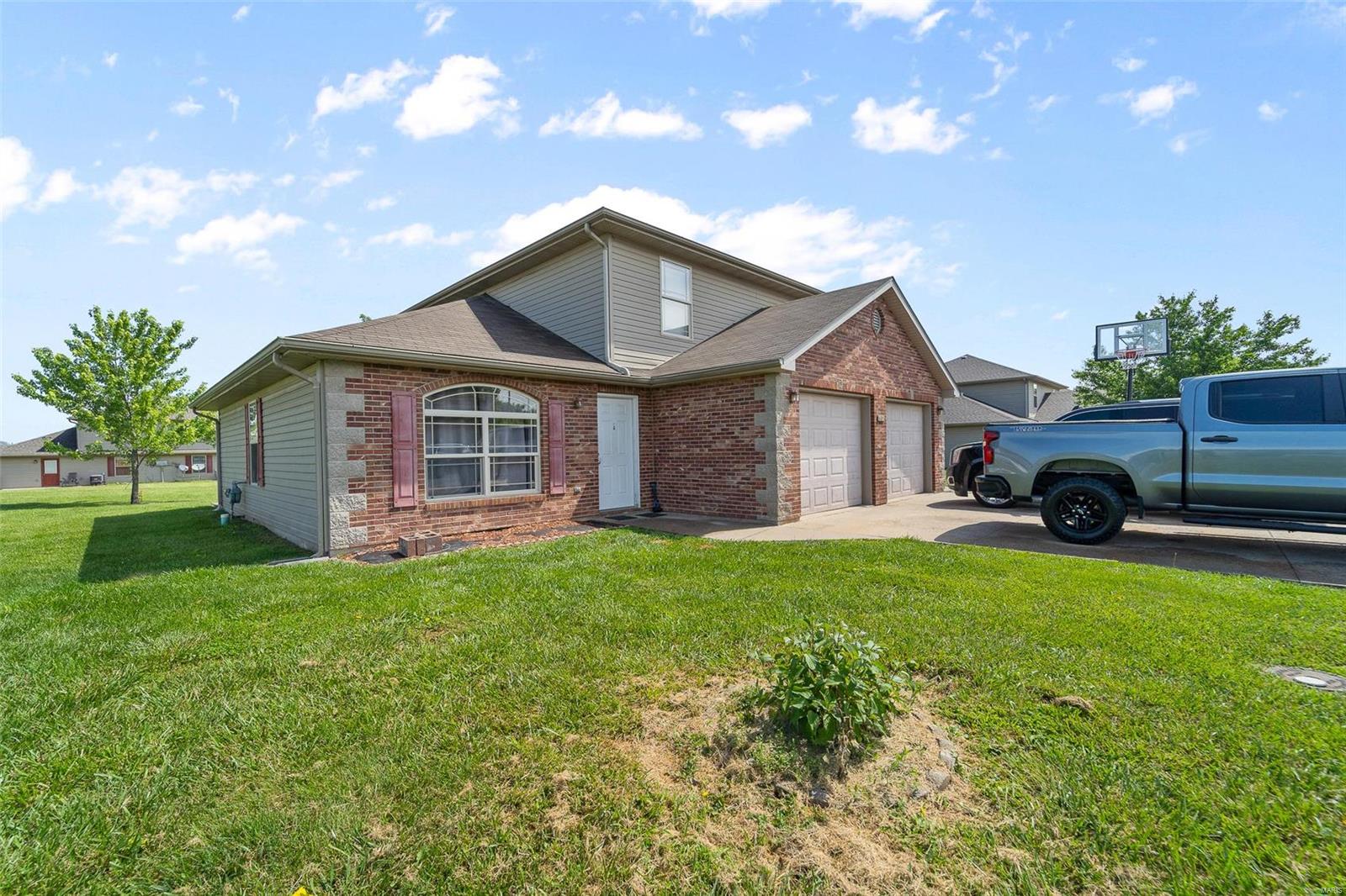 Excellent Investment Opportunity with this Duplex available in Palomino Ridge Subdivision in Ashland MO! Each Unit is 3 beds/2 baths/1 car garage boasting 1218 sq ft on each side. Both sides are currently rented on a month-to-month lease. Current rents are below market value. Tenants pay for all utilities. This is a great opportunity to add to your portfolio or live on one side and rent the other! Conveniently Located Within Walking Distance to Ashland High School and Middle School. Schedule your tour today for the chance to own in the sought-after town of Ashland with recent, significant growth and increasing rents.