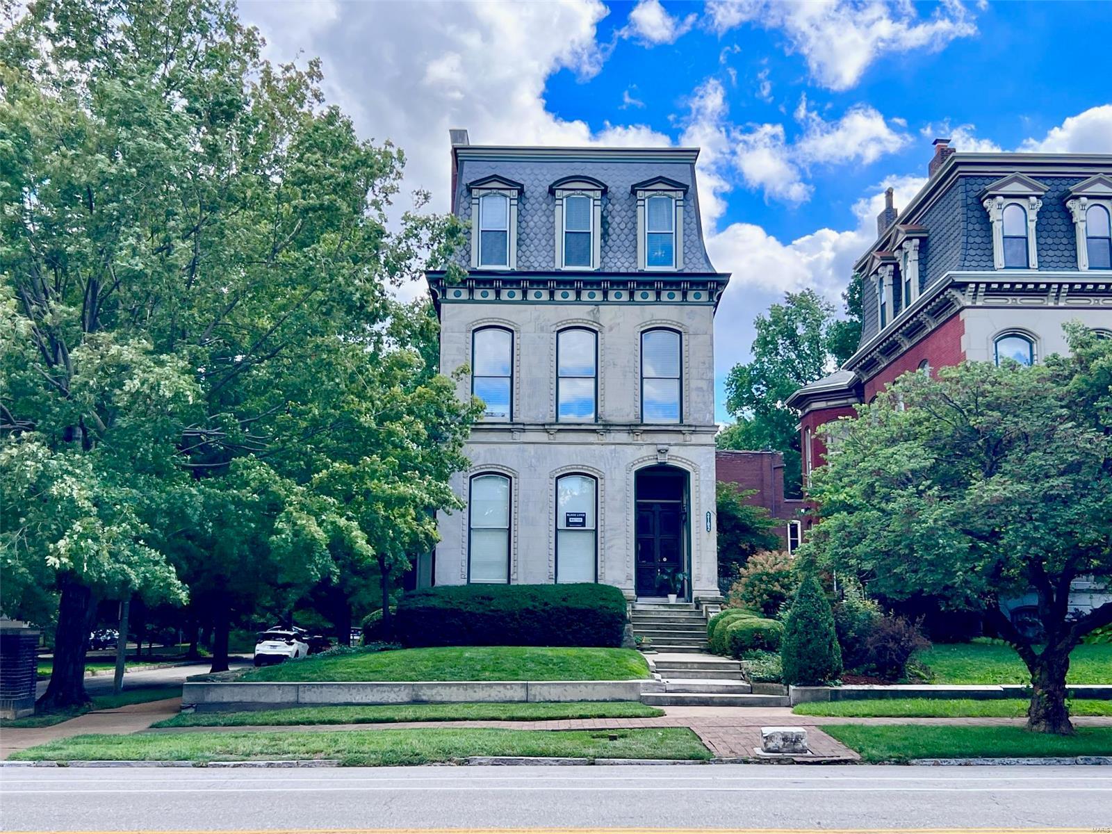 Exceptional 3-story Victorian multi-residence in the Historic Lafayette Square Neighborhood! Home to an inclusive group of residents & business owners who give life to this stately 188-year-old neighborhood. Picturesque with tree-lined streets and a vibrant 30-acre park-the oldest urban park west of the Mississippi! Restaurants, wine bar, coffee shop and local grocers surround. Owner occupy or rent every unit & watch your investment grow. Each floorplan showcases extraordinary architecture & details, top of the line finishes, & exquisite craftmanship. Comprised of two penthouse units & two sprawling 2-story units with an impressive amount of living space. Luxurious spaces, newer kitchens, renovated baths & more. Grand staircase, granite counters, ornate fireplaces, striking wood floors, intricate millwork, towering pocket doors & ceilings. Custom windows with  park views. Newer HVAC, water heater & systems. Impeccably cared for & renovated. Attached Income & expense with 7.24 cap rate