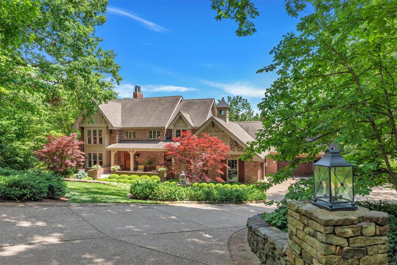 Stunning executive-style home on private 4+ acre estate within the sought-after Wild Horse Spring Farm subdivision in Larimore Valley. The beautifully landscaped grounds surrounding the house & pool are breathtaking. From the moment you turn into the driveway you'll feel like you've been transported to a 5-star resort. Luxury features include theatre room, hot tub room, lower level bar; entertaining area & wine cellar w/ 2000+ bottle capacity. Other amenities include whole house water purification system, high-end appliances, 40x20 pool with jump rock & stone decking surround, IPE wood deck plus large stone underdeck patio & a firepit area overlooking a sunset view. The estate is bordered by common ground as well as Babler State Park so privacy, wildlife & peaceful surroundings abound. Drive through the subdivision to enjoy the vast common areas & beautiful homes. Don't miss the video &pictures showing all of the beautiful/spacious rooms with large windows & custom features throughout! Additional Rooms: Wine Cellar
