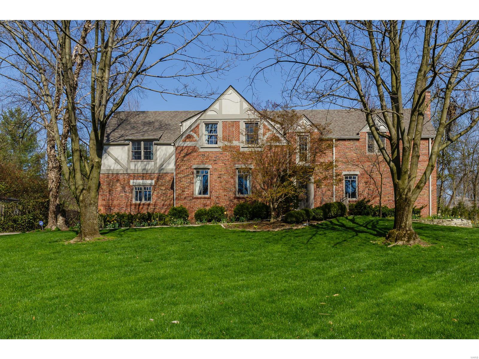Exceptional home in sought-after Ladue neighborhood! The moment you walk-in you will be captivated by the extraordinary craftsmanship of the 5" hand scraped red oak plank wood flrs thru-out entire 1st fl along w/the stunning open foyer that showcases main staircase w/wrought iron spindles. Pass thru the well appointed formal LR w/new FP surround/mntl. Then step into spacious family rm w/abundance of natural lighting from the wall of wndws/doors looking out to patio/pool area, exposed brick wall encompasses the gas fireplace. Open Kitchen/family rm. Spacious gourmet kitchen w/newer high end appliances, granite counters, 42" cab., lrg cntr island w/built in gas cooktop, sizable brkfst bar, plus brkfst rm. Mstr BR suite is one-of-a-kind w/study/sitting area, his/her closet, new mstr bath, heated flr, individ thermostat on ea shower head, free standing soaking tub.3 more B/R w/own baths all upgraded/or new. Literally cannot list everything this home features come see it for yourself today. Additional Rooms: Mud Room COOL: 14 SEER+