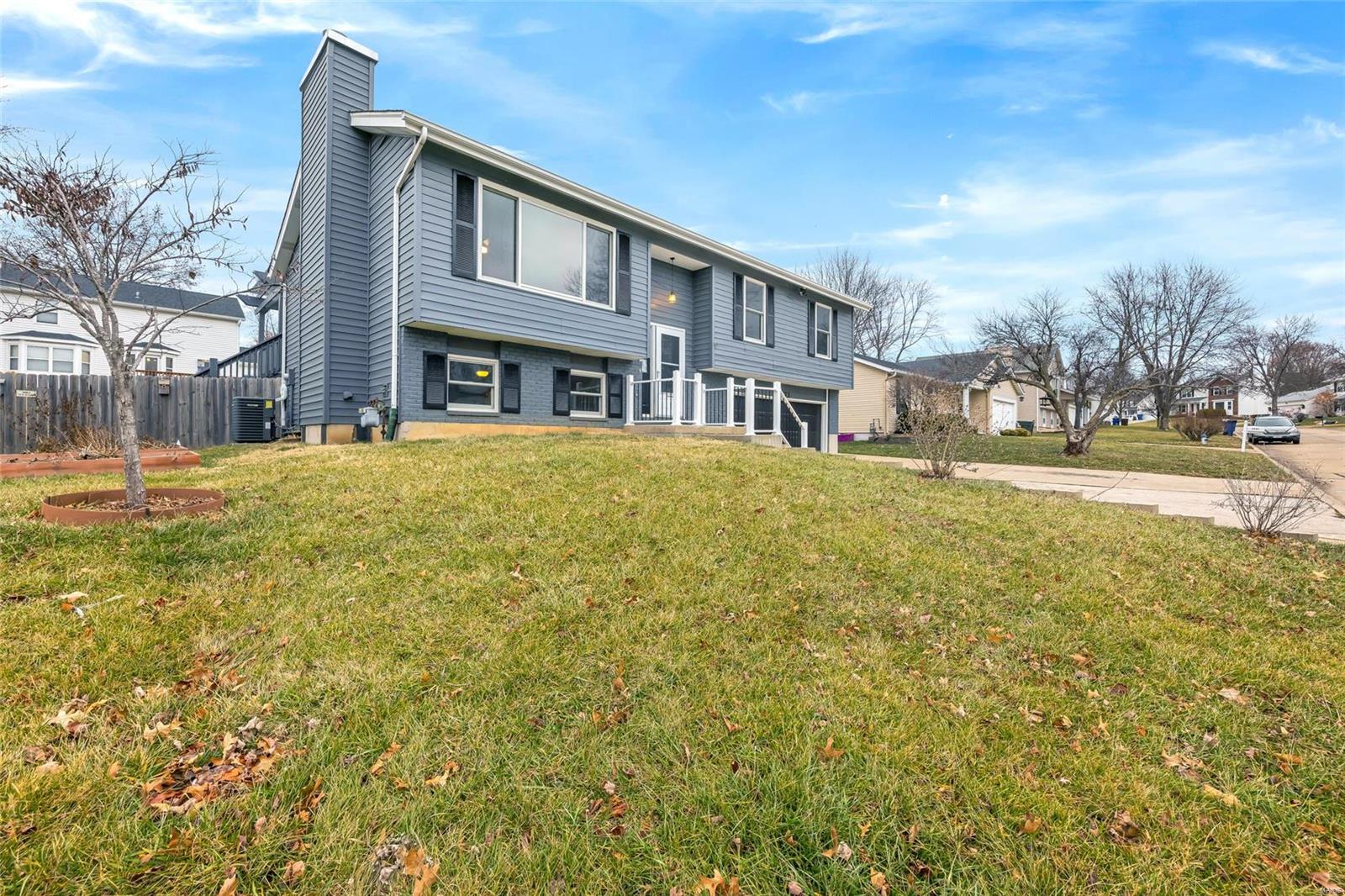 Don't miss out on this updated home located in the heart of St. Peters; conveniently near parks, shopping, restaurants, and I-70!  1273 Poseidon Court boasts newer flooring, paint, windows/doors, kitchen (appliances are still under warranty!), and bathrooms - plus all the little extras such as 6 panel doors, fireplace, tiled showers and lighted ceiling fans in every bedroom.  Tons of closet space, a professionally organized walk-in, oversized garage, and large shed will meet your storage needs.  There is a master suite located on both levels; perfect mother-in-law quarters or easily convert the lower level space into a great room.  Whether you are entertaining in the open floor plan, set up your workshop in the massive garage, or relaxing on the large pergola covered deck overlooking your fenced back yard, this home is sure to meet your every desire!