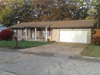 Over 2000 Square Feet of Living Space! Lower Level Has Professional Finish including Large Open Rec Room w Wet Bar, free standing Woodburning Stove, nicely finished Half Bath, Spacious Den/Office & huge nicely finished Laundry/Multi Function Room w Walkout to Lower Patio. Upstairs a Custom Kitchen/Dinning area with Granite Counters & Tile Backsplash, Custom Cabinets, large pantry, walkout to huge 30x12 Custom Deck. Vaulted Ceilings & Open Floor Plan, Custom Blinds Throughout & Hardwood Floor in Liv Rm & Hallway highlight the Upstairs. Liv Rm is Wired for Surround Sound. Located on a Quiet Low Traffic Cul De Sac, w Plenty of Privacy backing up to Woods. Great Curb Appeal w Nicely Landscaped Front & Backyard. A Custom Tree House in Back, the Kids will Love, An Additional Lower Wooden Deck, Large Concrete Patio Under Main Deck, Nice Utility Shed Stays. Large Oversized 2 Car w Custom Shelving Built in. Lots Of Space for Entertaining; Inside & Out. Home is READY to move in!Newer Roof & HVAC