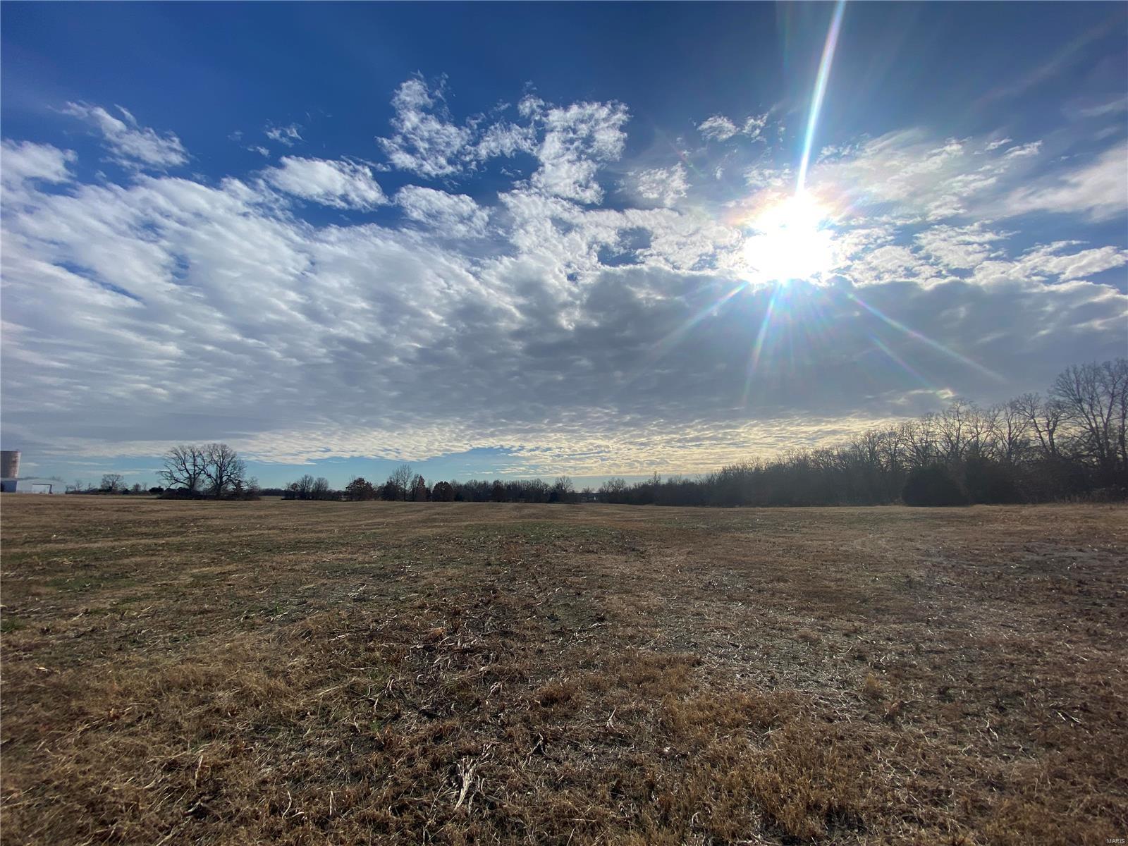 LOCATION LOCATION LOCATION!!! Looking for that tract of ground with plenty of interstate exposure? Then look no further because this tract is considered to be fairly flat with the possibilities being endless.  This would make a great spot for a potential campground or someone looking for quick interstate accessibility.  This land is even capable of being developed into a residential area due to it having road frontage on two sides. If you are looking for great exposure, then look no further!