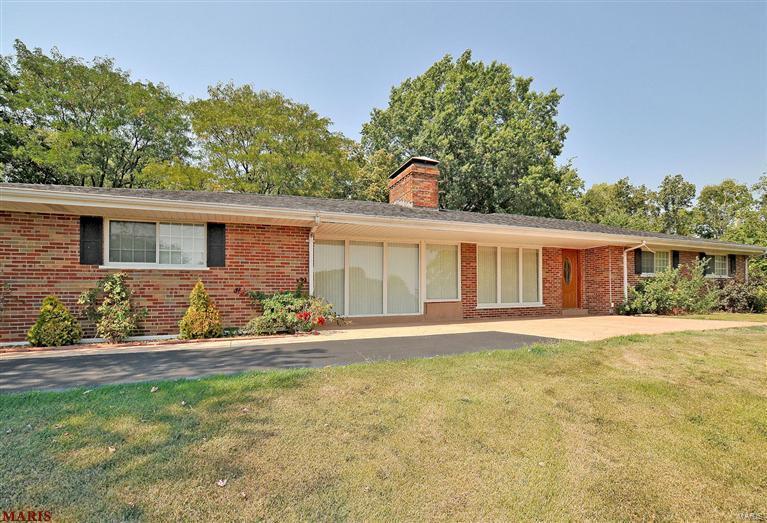 THIS 3 BEDRM, 2.5 BATH, 4 SIDED BRICK, RANCH HOME IS SITUATED ON A BEAUTIFUL 1.1 ACRE LOT, IN A QUIET SUBDIVISION, WITH A LAKE. IT HAS 2 CAR REAR ENTRY GARAGE. A PRIME LOCATION-MINS TO HWYS AND SHOPPING. THE ENTRY FOYER, KITCHEN, & POWDER RM HAVE MARBLE FLOORING. THE UPDATED KITCHEN HAS TONS OF CABINETS, GRANITE COUNTER TOPS, GAS STOVE/OVEN, BUILT IN MICROWAVE. REFRIGERATOR, WASHER, AND DRYER WILL REMAIN IN HOUSE FOR TENANT'S USE. ALL BATHROOMS HAVE BEEN UPDATED. THE LIVING ROOM AND FAMILY ROOM SHARE A 2 SIDED FIREPLACE WITH BUILT-IN SHELVING. THERE IS A SUNROOM THAT LEADS TO A PATIO WITH A PRIVACY FENCE. THE LOWER LEVEL HAS A LARGE REC ROOM, OFFICE, STORAGE AREA, OVERSIZE CEDAR CLOSET, AND A SPACIOUS BATHROOM. Additional Rooms: Sun Room