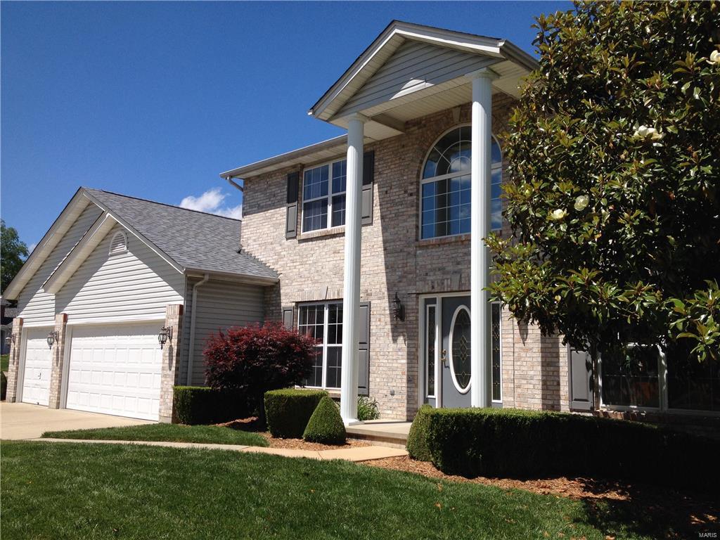 Move-in Ready & Great Location! This updated 2-Story had a new roof & new kitchen countertops just installed Spring 2017. Open floorplan, neutral decor, & great for entertaining! Soaring Foyer has wood floors & new lighting that leads to the Dining Room & Office, then the T-staircase leads up to a huge Master Suite w/jet tub & 3 Bedrooms/Full Bath. Main Floor boasts 9' Ceilings & Bay Windows. Laundry is right off the Garage next to a 1/2 Bath. Kitchen has new countertops, ceramic tile floors, wine bar & separate desk area. The finished walk-out basement has a Kitchenette, Dining Area, Great Room, and Game/Craft space, along with a clever 1/2 Bath. The Back Yard has an extended deck, stone patio, bubbling fountain, private Hot Tub, Playground Set, invisible dog fence, sprinkler system, & large flat side yard, while all surrounded by beautiful landscaping and shrubs.