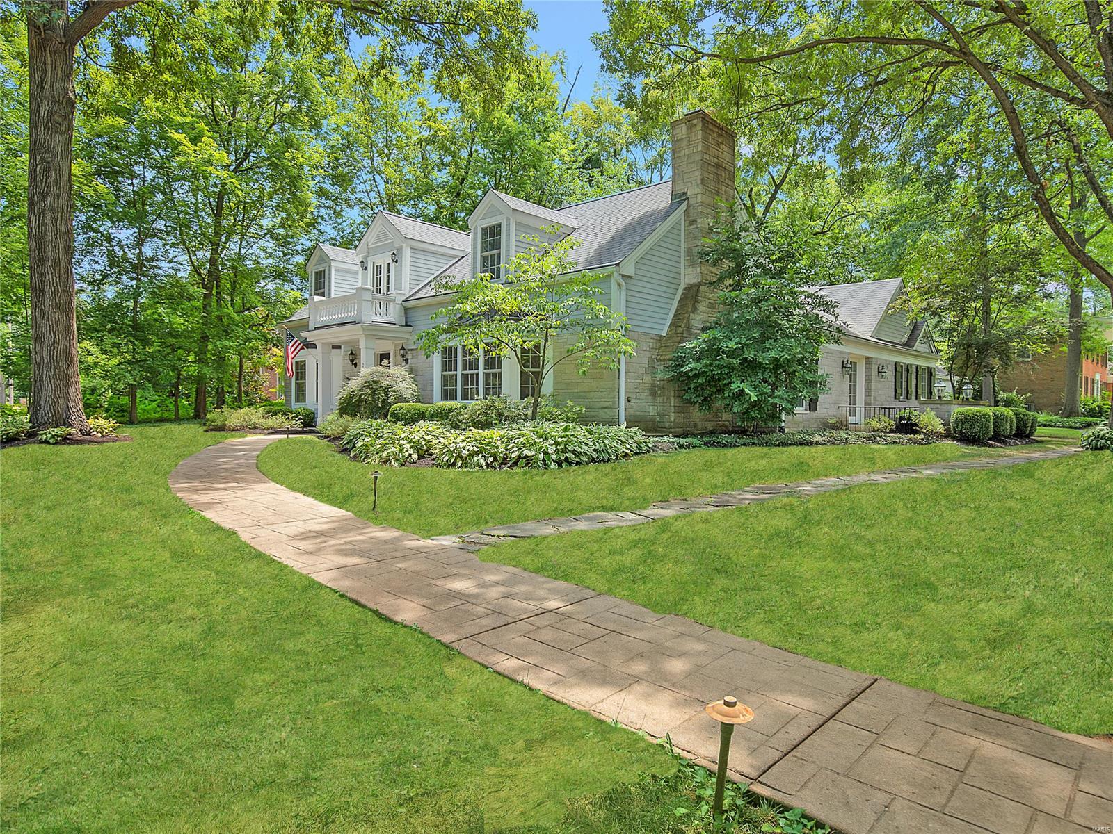 Fabulous New Price Adjustment!!! Move in ready! A timeless Cape Cod style home in a spectacular Frontenac location nestled on a park like .74 acre corner lot across the street from Villa Duchesne and Oak Hill School. Step into gracious living greeted by a grand staircase and custom millwork floor to ceiling. New dark oak engineered hardwood flooring throughout main level and updated elegant lighting throughout. Main floor oversized master suite with his and her closets and complimented by a spa-like marble master bathroom. Large custom kitchen with center island provides lots of space for entertaining. Family room with vaulted ceiling with newly added wood beams and a tiered oversized chandelier. Upstairs you will find 3 additional bedrooms and 2 full baths with a secret bonus room. This is a home for today's lifestyle. Live, work, play.
