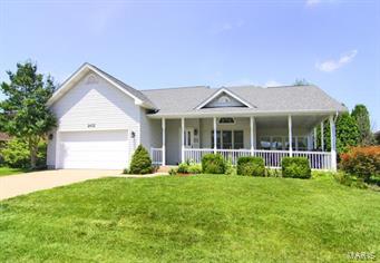 Unique 1.5 story home in a family friendly neighborhood within Schrader school district.  Soaring ceilings as you enter, nice bright kitchen with corian, back patio and awesome wrap around porch for lounging, new carpet throughout and new roof.  Main level master suite and bonus extra family room/sun room on main level adds extra living space!!  Laundry hook-ups on the main level and basement level.  Extra finished space in the basement perfect for play room, office, or den.  Lot's of extra storage, just off Lexington close to everything!