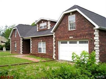 Recently updated 3 bedroom all electric brick home with 2.50 baths on a corner lot. Unusual open floor plan with a large brick fireplace in the kitchen & living room area. New stainless steel appliances: stove, microwave, dishwasher & refrigerator. Attached & detached garage: the detached garage has a 1/2 bath & a bar. Stone patio. French doors open to the 16x16 deck. Land measurements are based on records of the St. Francois County Assessor; all other measurements have been performed by non-qualified persons and may be inaccurate. Square footage has been figured by length  & width of each room, and the total added; hallway, etc. were not calculated.Square footage and land area measurements are based on records of the County Assessor, and or have been performed by non-qualified persons and may not be accurate.