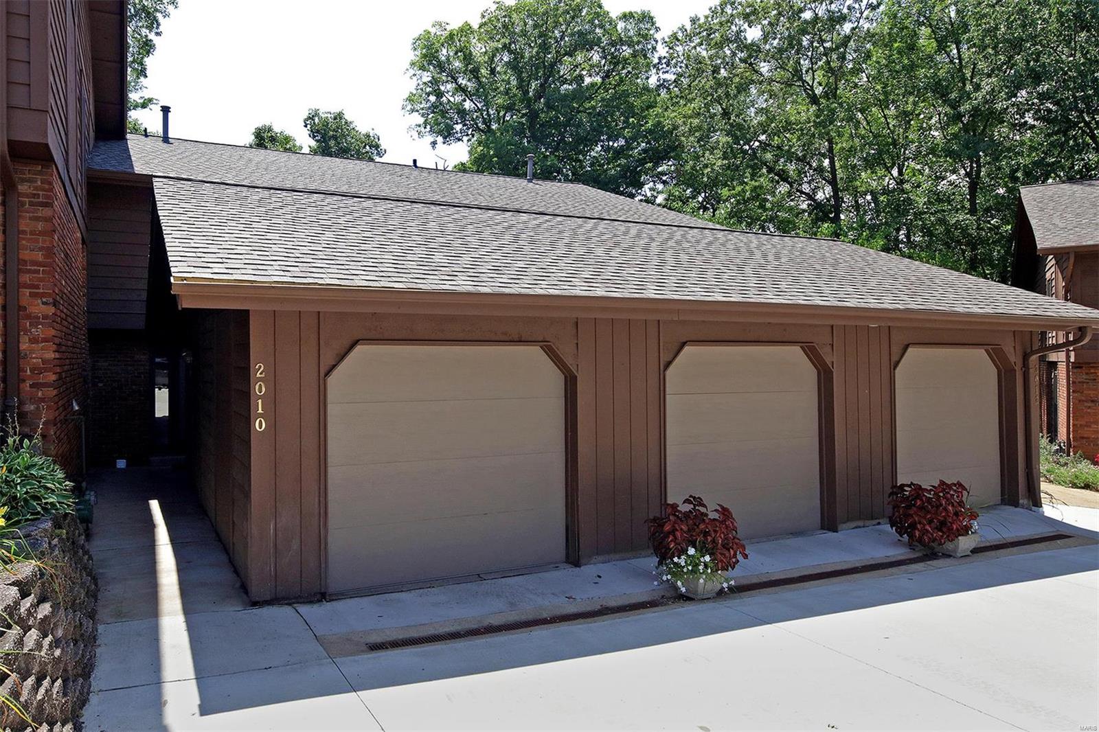 One of the largest town homes in the complex with 3 bedrooms and 3 full and 1 half baths. Interior of condo has been freshly painted with newer kitchen and baths. Main level has beautiful hardwood floors and upstairs and lower level have new carpet. Kitchen has stainless appliances, crown molding, granite counters, tile back splash and custom cabinets. Large living room has hardwood floors and two sliders that open to a large deck overlooking the woods. Very private setting. Newer half bath on the main level has adult height sink and hardwood floors. on the 2nd floor is a large master bedroom with updated bath with beamed vaulted ceiling and walk-in closet outfitted by a closet company. Two additional large bedrooms with vaulted beamed ceilings and an updated bath. Lower level has a large family room with build in book shelves, fire place with gas logs  a wet bar and 2 sliders to a large patio. Plenty of storage. Complex has pool and tennis courts. Great location close to everything. Location: End Unit