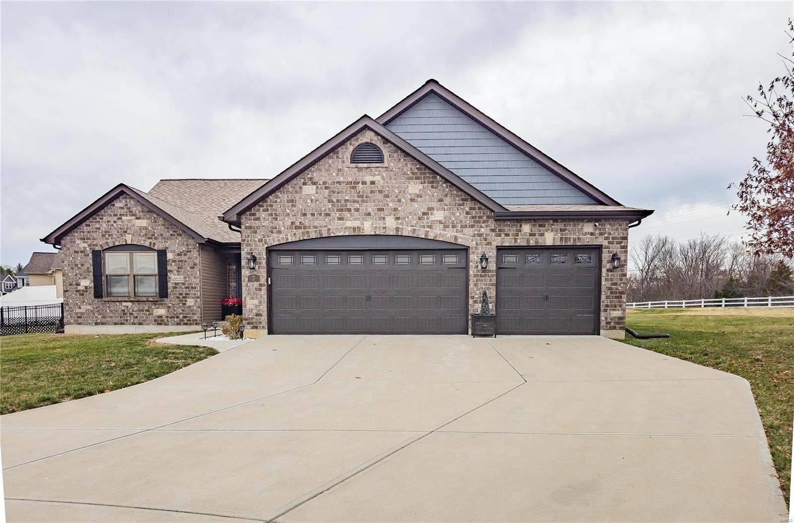DON'T MISS THIS CHEERFUL HOME, designed to provide a wonderful living experience! The SPACIOUS ENTRY FOYER leads into bright, OPEN CONCEPT FLOOR PLAN RANCH, w/vaulted ceilings, luxury WOOD FLOORS, upgraded arched 2 panel interior doors & trim package. Gather friends & family into the GREAT ROOM w/cozy FIREPLACE, overlooking the FENCED yard, covered patio & POOL. Chef's kiss kitchen has QUARTZ COUNTERTOPS, SS appliances, pantry w/ 42" cabinets, making meal prep & dining a joy. Master bedroom has ENSUITE w/seperate shower, oversized soaking tub & huge walk-in closet. Split bedroom floorplan allows privacy w/generous sized bedrooms & 2nd full bath. The MAIN FLOOR LAUNDRY room & handy 3rd 1/2 bath, are just off the OVERSIZED 3 CAR GARAGE. Full BASEMENT has egress window, rough-in for 4th bath, higher ceilings to finish for add'l living space.  Beyond the walls of this IMMACULATE HOME, lies a gorgeous neighborhood with EASY HWY 55 ACCESS, near R7 schools, shopping & golf course.