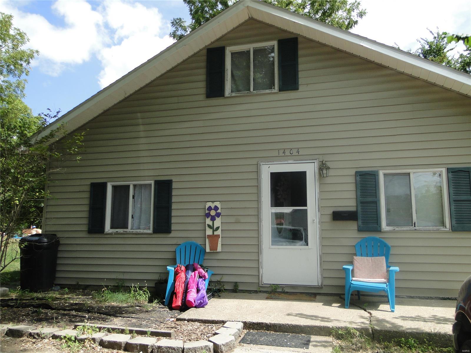 Landlord looking to downsize his properties. This gem with a large lot located close to downtown is waiting for it's new owner! New roof installed approx. 3 years ago. Newer floors throughout. This would make a great starter home. Kitchen doors out to patio boast built in blinds. Main level laundry, and master bedroom. New furnace installed.