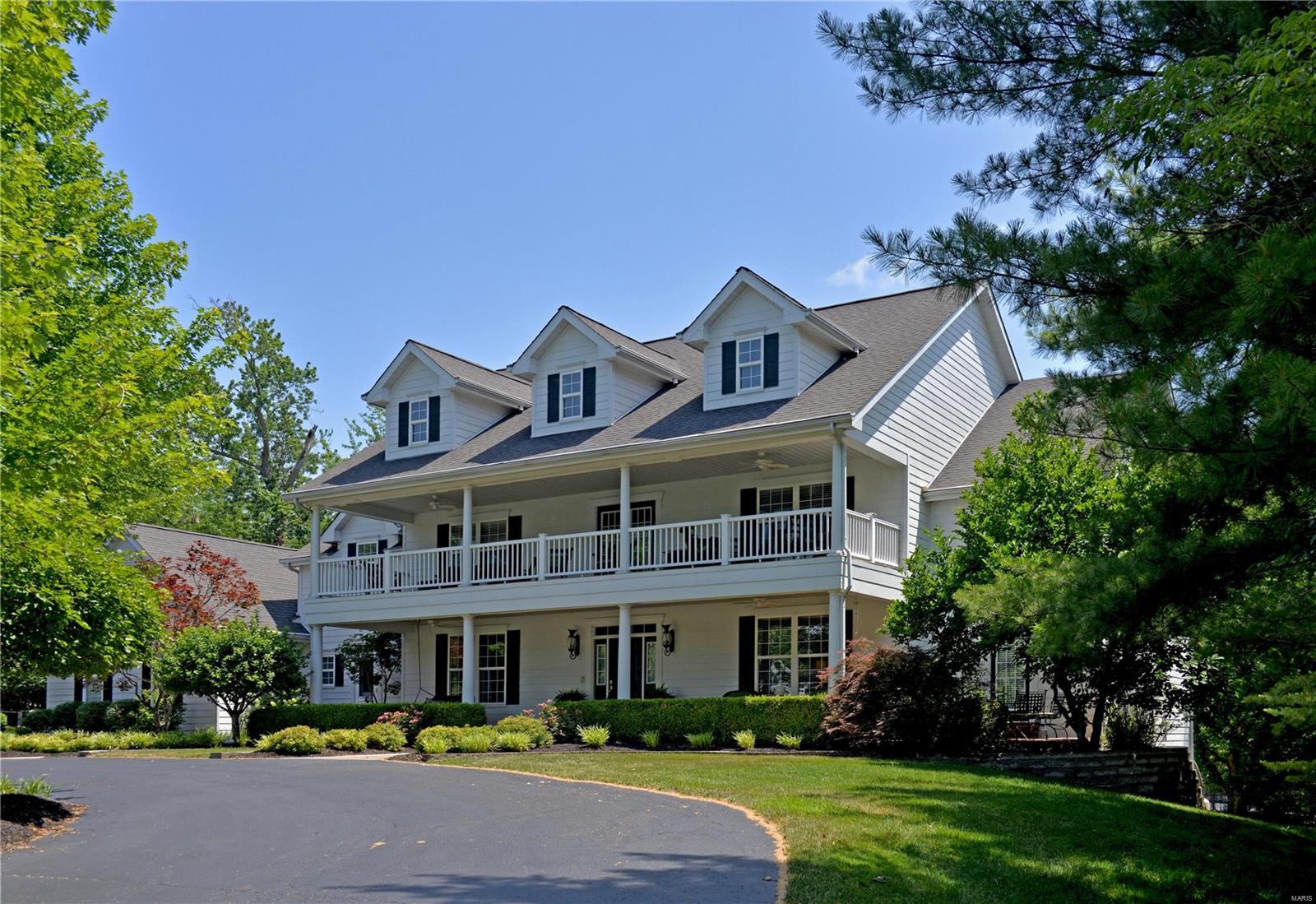 A must see! This beautiful Southern manse is located directly across the street from Queeny Park and boasts 2 large covered porches where you and your family will enjoy gorgeous sunsets overlooking the park. This 6 bedroom home has everything you are looking for in a family home, and with over 6,000 sq ft of finished living space, provides plenty of room for entertaining or just relaxing.This house has it all. A chef's kitchen with high-end appliances and Sub Zero refrigerator and a large custom organized pantry. Large, beautiful dining room will accommodate seating for 10-12. Master on the main with large organized walk-in closet, master bath with heated tile floor, whirlpool tub and separate shower, 4 bedrooms upstairs, 3 with walk-in closets, and 2 with hideaway study rooms.2 Jack & Jill baths serve the upstairs bedrooms. Entire house is wired for sound including all outdoor areas. Additional Rooms: Sun Room