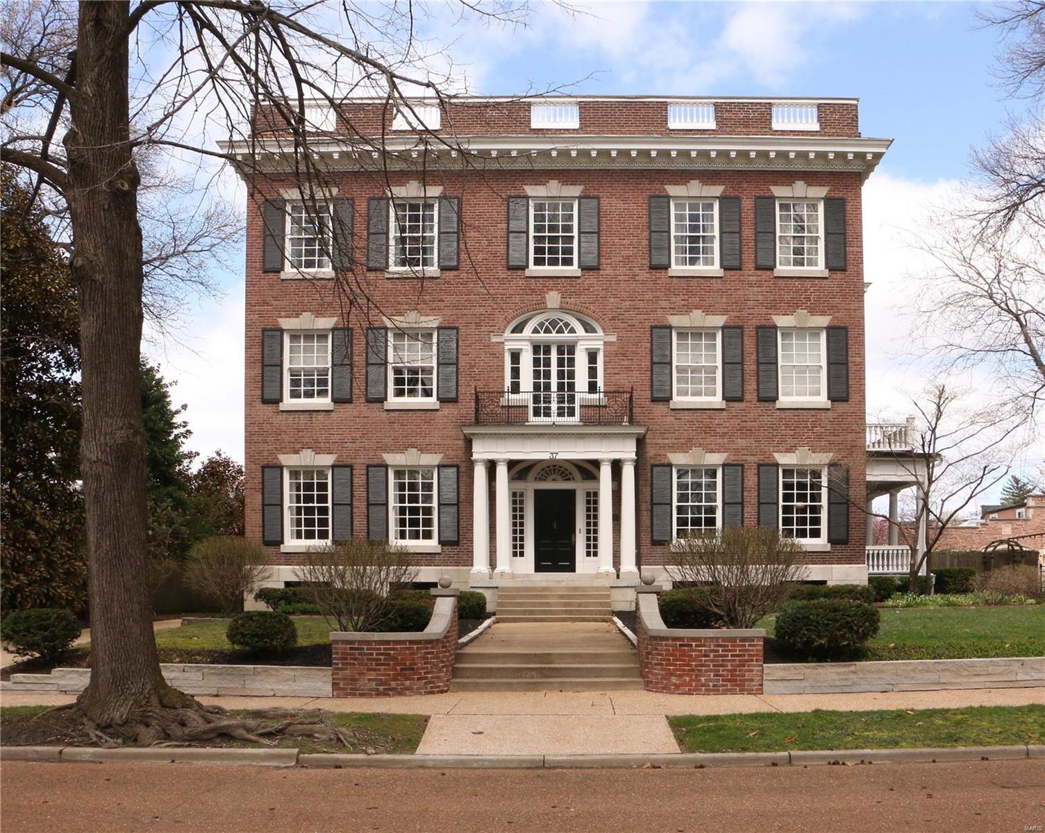Seller has reduced the price to an unheard of price.  $950,000...   Seller to do no inspections or repairs.  Buy can have inspections for informational purposes.  No negotiating on price. Come see elegance at its finest.  LOOK AT THE PICTURES.  This home has it all...size, location, privacy, the ability to entertain parties from family get-togethers to fundraisers. Verandas, sun porches, meditation garden, children's play area, 3-car garage with separate entrances for each, walk-out 3000+ square-foot basement perfect for storage, activities room, or even a bowling lane or two.  Located off Lindell Blvd, parallel to the middle of Forest Park in a secured community; each home on the street is unique, private and graceful ranging up to 2 million in value This established community is minutes from The Muny, The Fox, Powell Hall and downtown. Come see a one-of-a-kind home with old-world charm and elegant features too numerous to mention and eye-opening to see. Put in $200,000, make $500,000