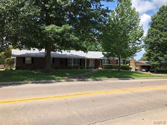 Super immaculately maintained all brick ranch on shady corner lot with approximately 1700 finished square feet on the main level to include formal & informal living & dining, three bedrooms & two baths, some wood floors, gas fireplace and lots of closet space.  But wait, that's not all - the lower level is almost completely finished with full living quarters to include kitchenette area, office, family room, laundry, storage and workshop area.  The lower level bedroom has a door for egress/staircase to backyard.