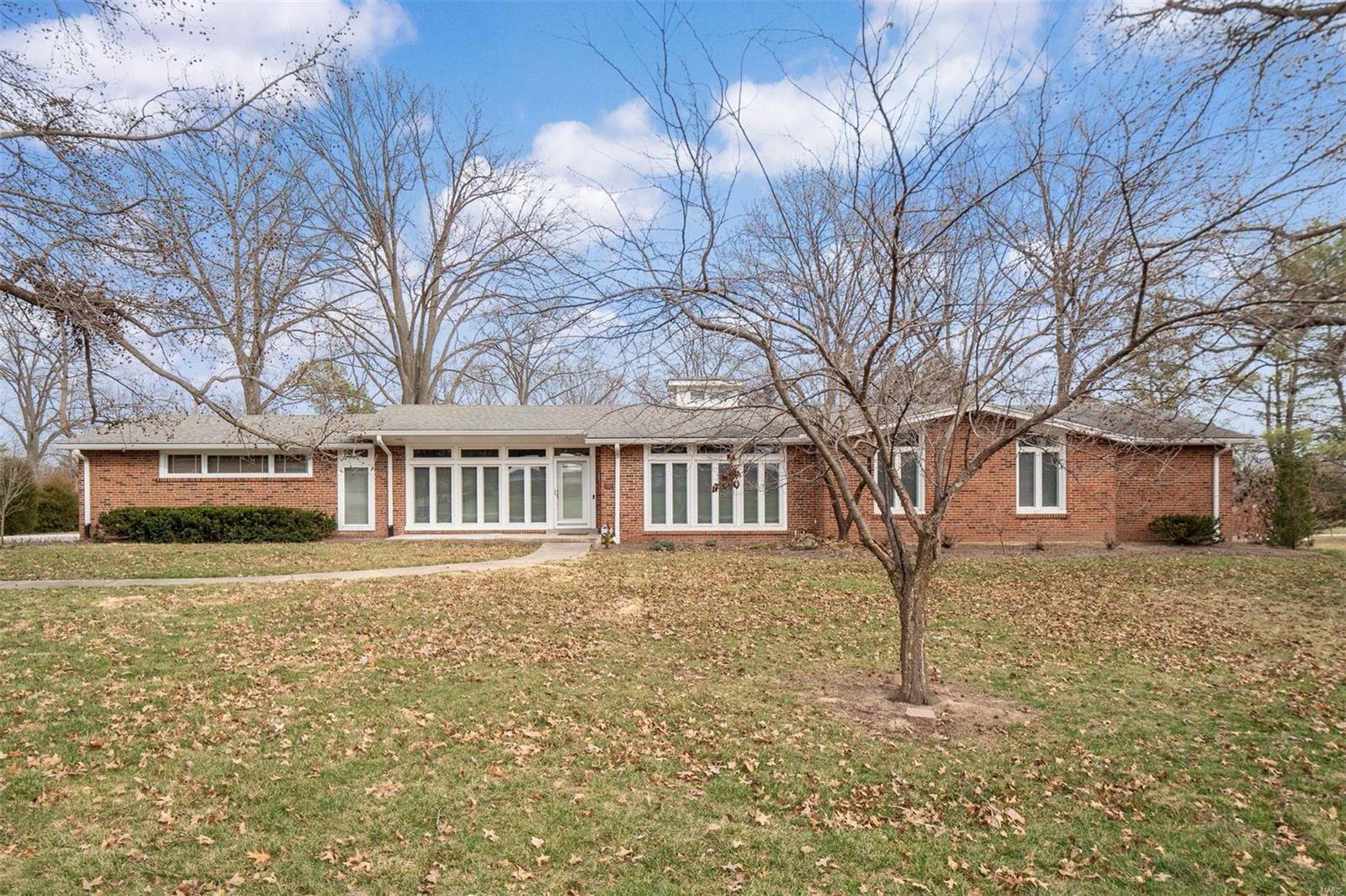 Welcome to your new home in the sought-after Ladue Estates Subdivision! This stunning ranch offers the perfect blend of comfort and functionality. Upon entering the home, you’ll find gorgeous hardwood floors throughout and ample natural light. After being welcomed by the spacious double-door office, you’ll find the heart of the home lies in the expansive kitchen that seamlessly opens to a family room, creating a central hub with a gas fireplace. A true highlight of this property is the large finished basement, complete with a convenient small kitchen and a full bathroom. With 4 bedrooms and 4 full bathrooms, including a luxurious primary suite, there’s ample room for the whole family. Location cannot be beaten with its proximity to schools, highways, and the nearby Malcolm Terrace Park to ensure a lifestyle of ease and enjoyment. Don’t miss the chance to make this your forever home! Additional Rooms: Mud Room, Wine Cellar
