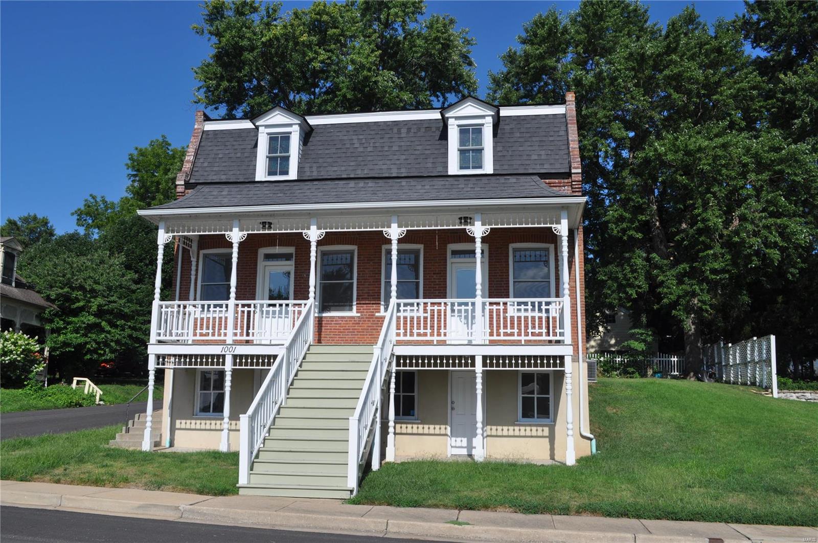 All the character of a historic home with the updates of a new home! This beautiful home is located in historic Frenchtown in St. Charles, MO. and is within walking distance of Main St. AND has convenient access to the Trolley. Head anywhere on Main St. or even over to the Streets of St. Charles without having to drive! The inside of the home has been completely rehabbed and includes a gorgeous kitchen, spacious bedrooms and bamboo flooring throughout. The upper level of the home includes two bedrooms and two bathrooms, while a third bedroom and bathroom are located on the lower level. Another perk of this home IS the lower level. It has private entrances, a full bathroom and bedroom and plumbing for a kitchenette. Plenty of room for a college aged child who wants to live at home but still have some privacy, a home office for your business, or even a space to rent out (AirBNB anyone?!)! The possibilities are endless! Come see this gem of a house today!