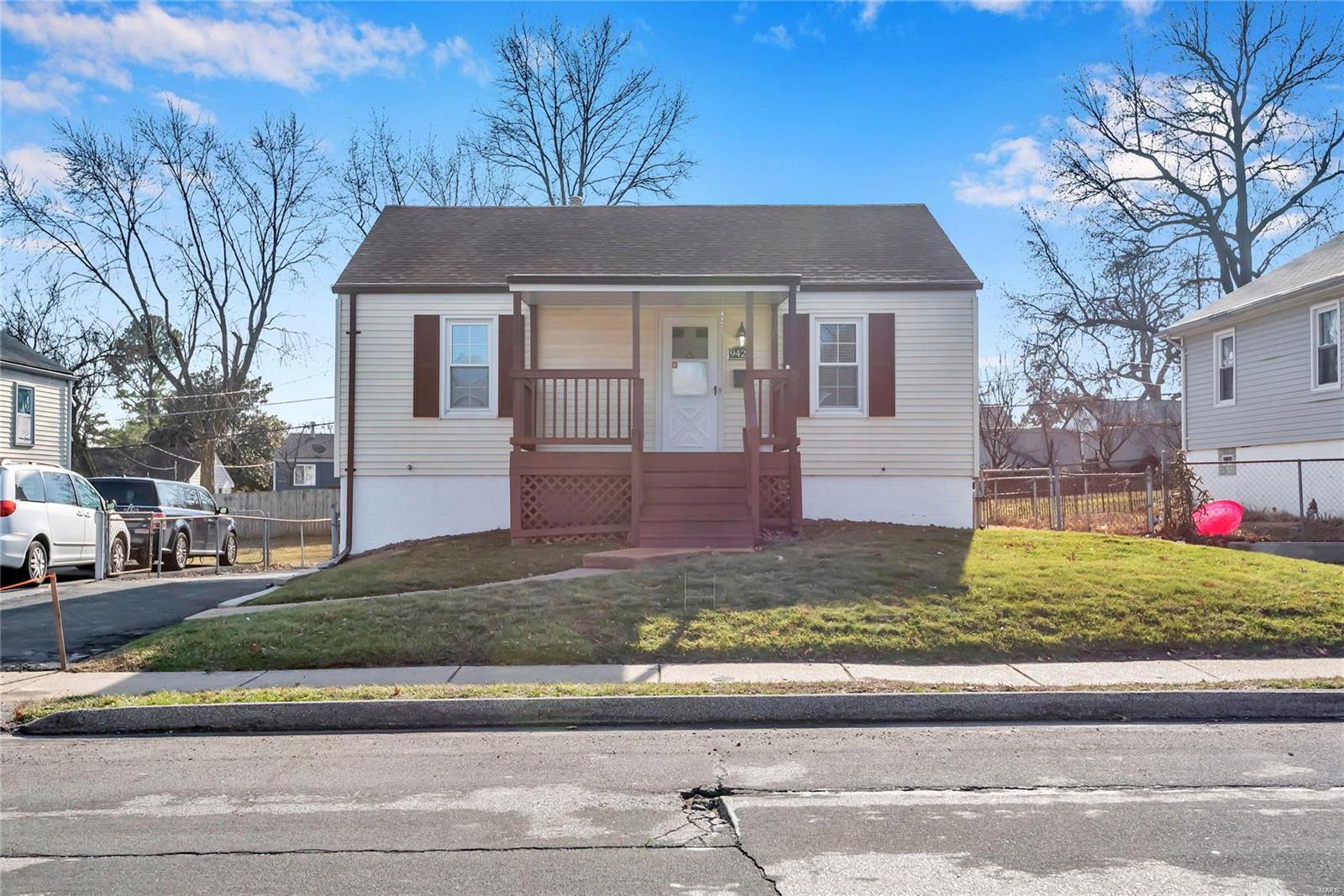 This Beautifully UPDATED home in the heart of Overland is the one you've been waiting for! Extremely well maintained & fresh with updated features. It welcomes you in right away with a large covered front porch. Come inside, enjoy the cozy family room, bright welcoming kitchen featuring NEW granite counters, gleaming NEW backsplash, double oven range, NEW easy to care for water resistant luxury vinyl plank flooring. All NEW paint and Flooring throughout. Bathroom has updates you'll love & includes a handy linen closet. Bedrooms are comfortable & roomy with generous closet space. Newer vinyl replacement windows. Full walk-out basement, laundry hookups, dryer to stay! Outdoors you'll enjoy your covered deck overlooking level fenced backyard, large storage shed for all your equipment or even a workshop. Freshly sealed driveway, turnaround drive in rear. Roof 2012. Furnace/AC/Water Heater replaced in 2016. So much to love & close to everything. Agent owned. Schedule your showing today!