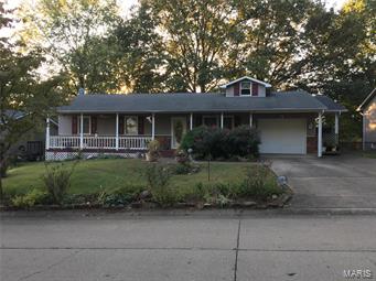 Updated ranch home with lots of amenities.  Plenty of room to grow with approximately 2300 square feet.  Two bedrooms on main level with additional rooms.  Half bath on main floor, basement with full bath & jetted tub, as well as a family.  Main level laundry with island in kitchen/dining area with lots of cabinets, and storage space.  Sun-room off back porch with koi pond nicely landscaped and two storage sheds. Additional Rooms: Sun Room