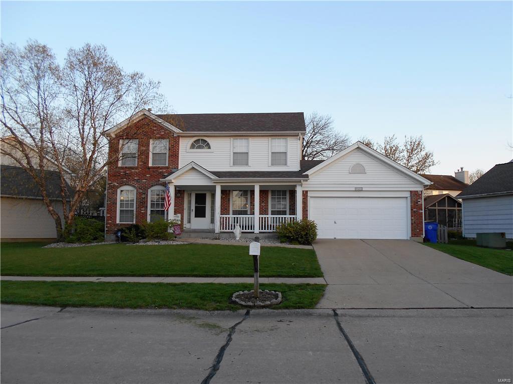 This nice large 2-story home located in the sought-after Wellington Farms subdivision offers 4 bedrooms, 3.5 baths.  Home also includes separate dining, main floor laundry, brick fireplace, stainless steel appliances, center island, newer roof and an unfinished basement which provides built-in shelving for ample storage.  The master bedroom offers walk-in closet and newly updated master bath with separate shower and tub.  The subdivision is located in Francis Howell School District with convenient access to Hwys. 40, 94 & K.  HSA Home Warranty provided with this sale.