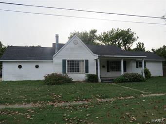 Over 1800 square feet gives you room to spread out in this 4 bedroom, 3 bath home in East Prairie. Spacious kitchen could use some updating, but has plenty of cabinetry for storage. Current set up has a 4 element range top with separate, raised wall oven for easier cooking access. 2 car attached garage turns in off of North Street, with room in the driveway for more, and steps directly into kitchen. Backyard is privacy fenced and has a patio area large enough to relax on during the warmer months, and a fireplace adorns the dining space to help keep the house cheerful and warm in the winter months. Come have a look at this modern charmer. SpecialListingConditions: Foreclosure