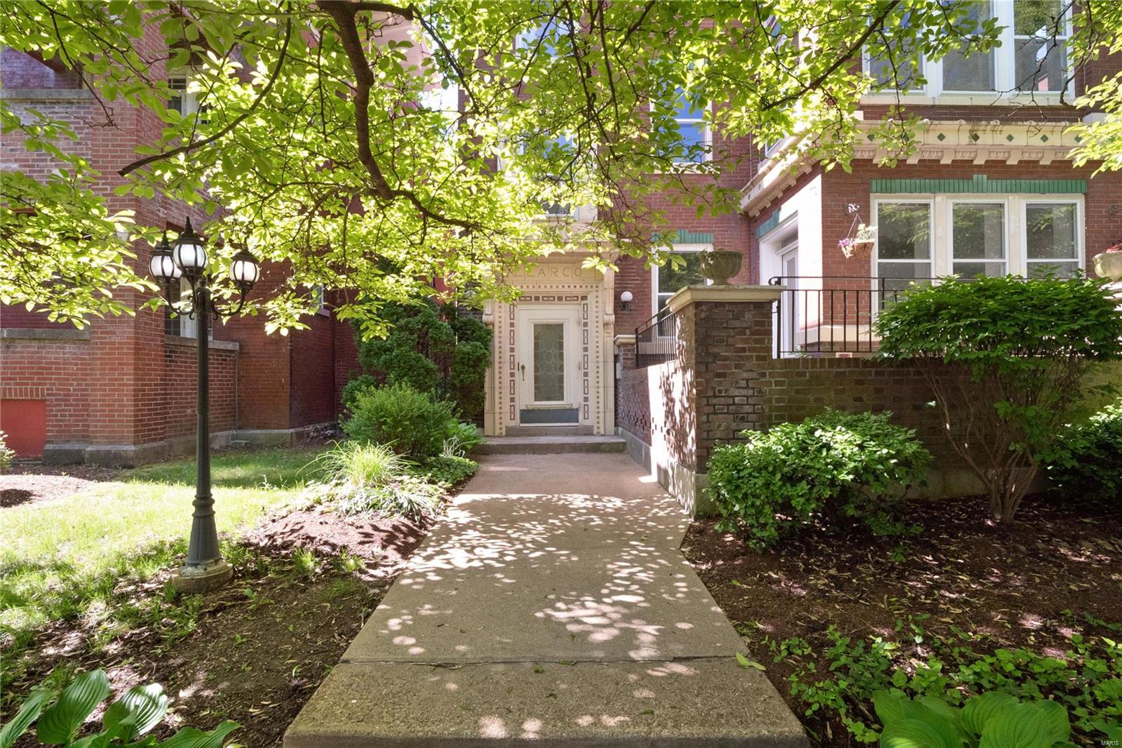 Rare opportunity in the booming DeBaliviere Neighborhood!  Located near the center of everything - close to the Metro, Washington University, St. Louis University, Clayton, the Central West End and an easy stroll to Forest park!  Spacious rooms come together for a great layout that would be ideal for a variety of living arrangements.  The main living area features hardwood floors, a fireplace with built-ins and a bright sunroom!  The dining room is perfect for dinner parties and has an elegant bay window.  Get creative and you could alternatively use the space as a den, library, office or studio!  Cooking will be a breeze in the large eat-in kitchen with a cheery window seat - perfect for sunny mornings with a cup of coffee.  Three bedrooms include a primary suite with an unbelievable private bathroom!  The primary suite even includes a second sunroom space.  A private, in-unit laundry, private off street parking and additional storage unit makes this condo the total package! Location: City