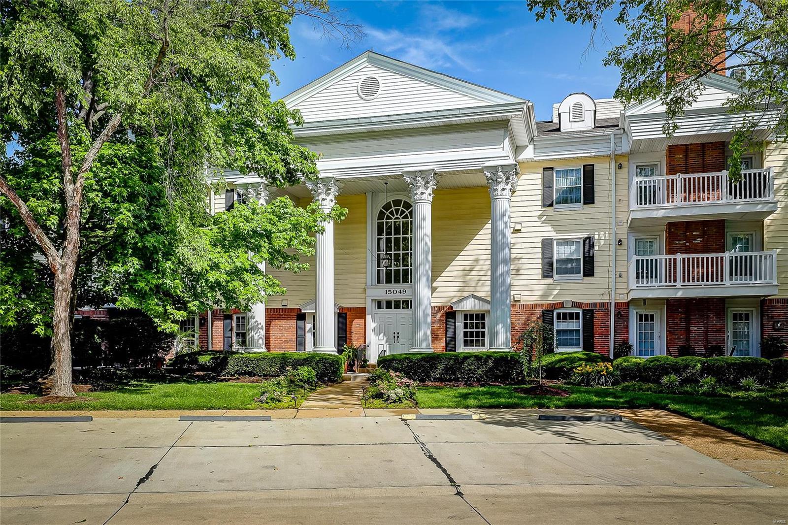 Available for showings on 6/24 BUT you can take the 3D tour today! There is so much to love about this fabulous MAIN LEVEL condo w/ premier location! The exterior includes a huge private courtyard which is the perfect spot to enjoy your morning coffee or entertain family & friends. This unit includes a large living room with electric FP , separate dining room, eat-in kitchen, master suite with WI closet w/ organizers & master bath with double vanity & WI shower. There is also a 2nd bedroom, hall bath & laundry. Some recent updates include paint, carpet (there are hardwood floors under the LR & DR carpet), laminate flooring, granite counter tops, HVAC, Dishwasher, Washer & Dryer, bathroom surrounds, stone patio courtyard & roof/gutters. This home includes beautiful crown moldings, six panel doors, plantations shutters, storage & 1 car assigned parking garage. The complex has 2 pools, clubhouse, pickle ball court, 2 storage areas, ample parking at the front, elevator, intercom & more. Location: Ground Level, Suburban