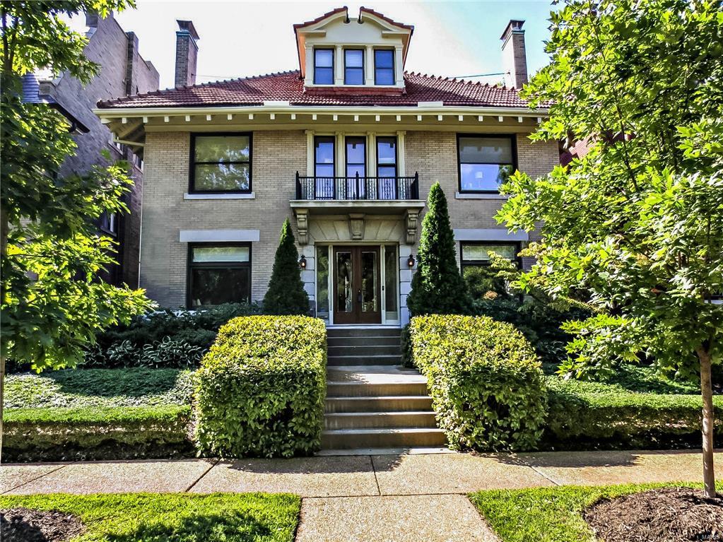 This light, bright century manse is situated on one of the Central West End's private streets. Enter the front vestibule to a grand entry hall. The library features built in bookcases, box-beam ceiling, and one of 6 fireplaces.The parlor has another fireplace, built in's, leaded windows and box beam ceiling. Through the parlor to the dining room with 3/4 oak paneling, another fireplace and more leaded windows. Through the dining room and adjacent to the kitchen is an over sized bonus sun room with windows on 3 sides. The generously sized, newly updated kitchen is a chef's dream with Viking appliances and granite counter tops. The second level has a wonderful large master suite with sitting room and fireplace, plenty of closet space, built in cabinetry and master bathroom, 3 add'l bedrooms, another bath, and 2nd floor laundry. 
The 3rd floor has 2 add'l bedrooms and a new bath. Carriage house with apt. 1200 bottle wine cellar. Lush landscaped outdoor space with patio/deck and Koi pond. Additional Rooms: Sun Room