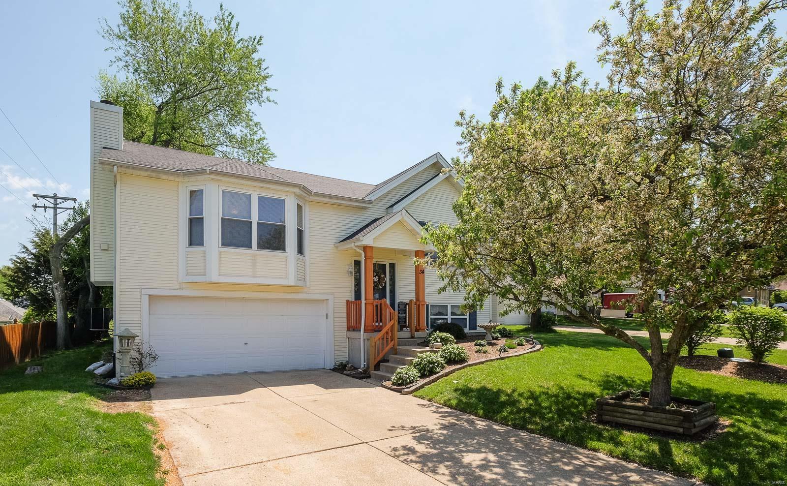 Hurry and see this awesome home in St. Peters.  With 3 bedrooms and 2 full baths this sweet split foyer is in demand.  Newer laminate flooring and vinyl in the kitchen and main bath, updated lighting, neutral paint make this home move in ready! Peaceful fenced backyard, relax on your large deck and enjoy!!!