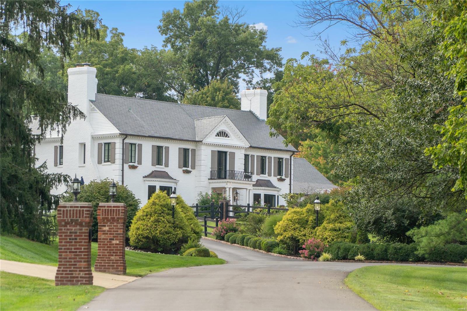Welcome to this stunning Country Estate in coveted Huntleigh, where timeless elegance meets Modern Luxury. Nestled on 3 picturesque & private acres, this Gale Henderson-designed Masterpiece, originally built in 1939, underwent Significant Renovations/Additions in 2005, blending historic character w Modern Lifestyle. The Estate boasts 10,000+ sq ft of Liv space, high ceilings, spacious rms, & Recently Updated Systems/Windows/Doors/Roof(Extensive list in supplements). Main flr primary ste offers a spa-like bath & serene views, while the chef’s kitchen is perfect for entertaining. Enjoy seamless indoor-outdoor living w/ a Great RM opening to a covered porch, cedar deck, & resort-style pool. The all-season pool house (a wing of the main home) includes a kitchenette, bedrm ste, Rec rm & Gym. Beyond the main residence, explore barns, horse stables, a sport court & stunning scenery. 5-car garage, manicured gardens, & rolling pastures, this estate is a rare & luxurious Homestead in Huntleigh. Additional Rooms: Wine Cellar